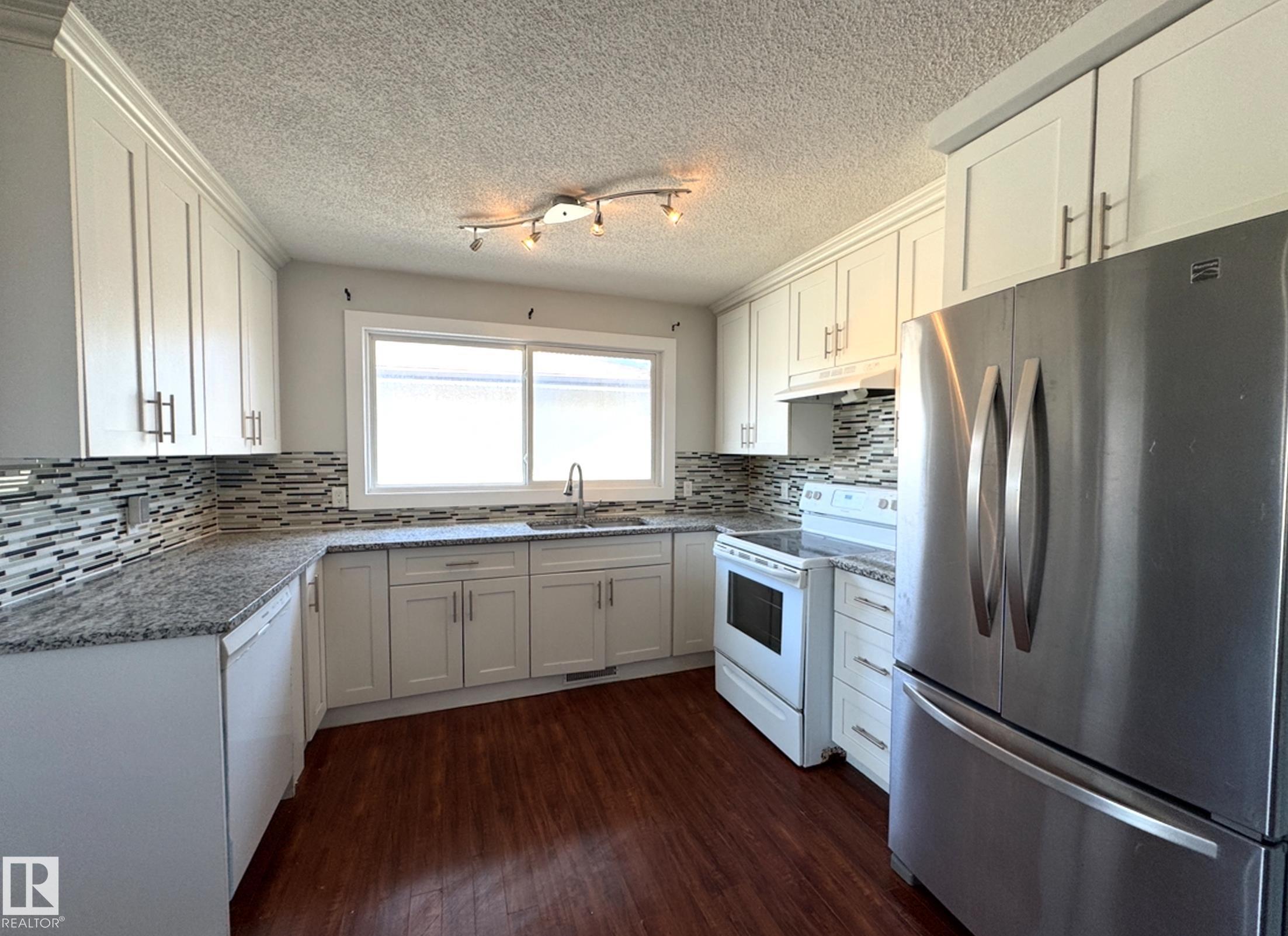 Photo 2 at 8815 140 Avenue NW, Northmount, Edmonton