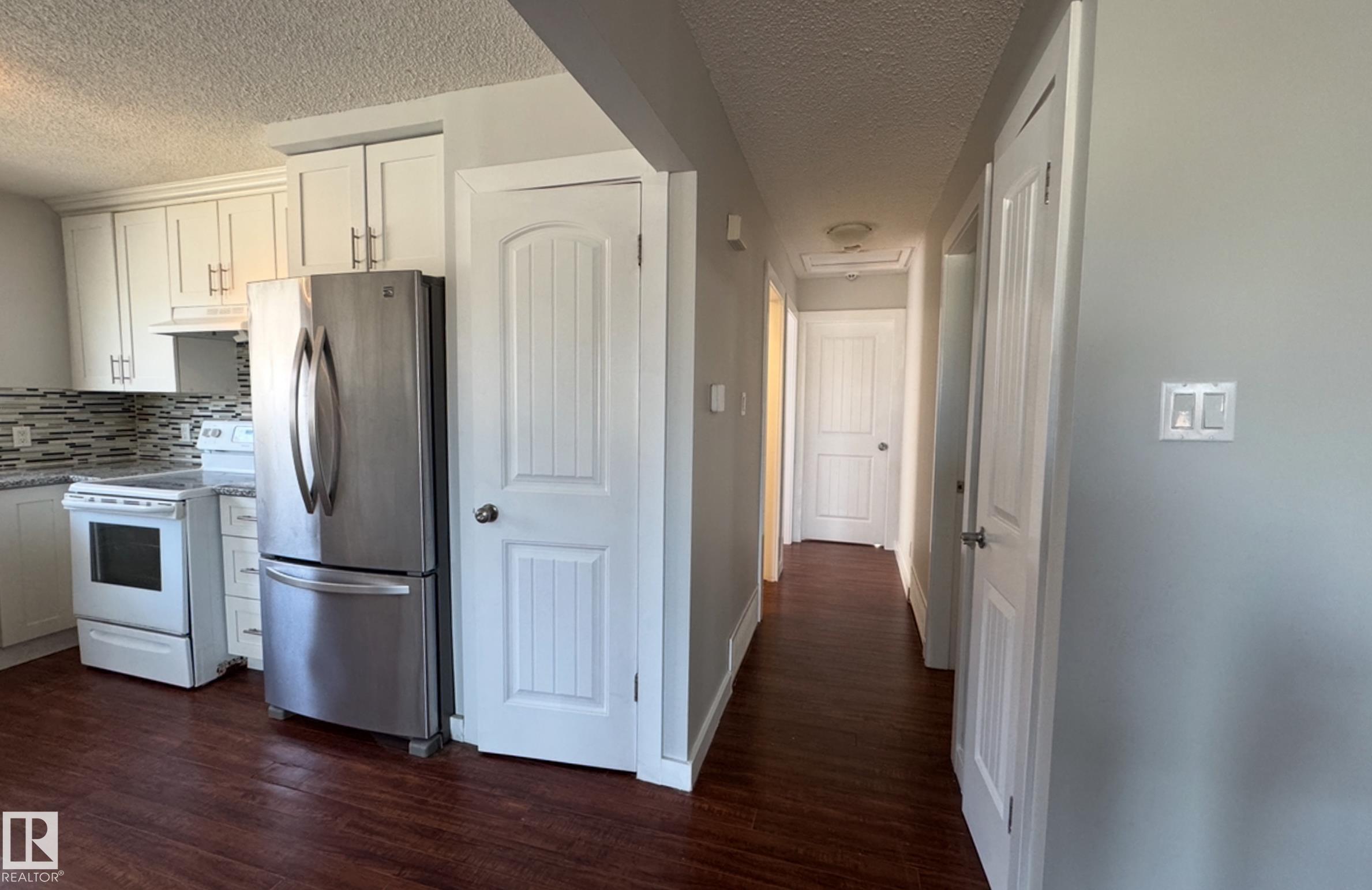 Photo 4 at 8815 140 Avenue NW, Northmount, Edmonton