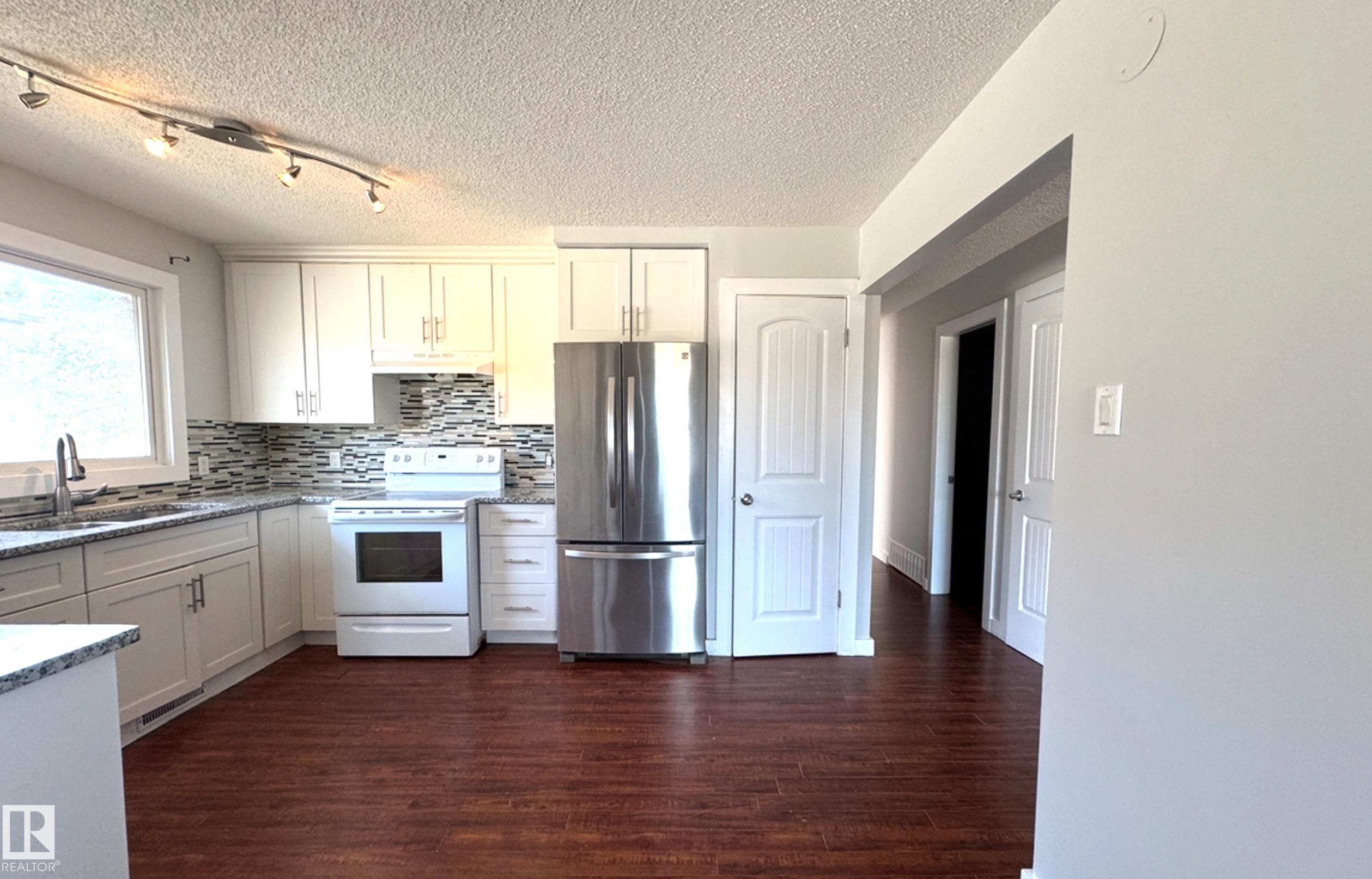 Photo 6 at 8815 140 Avenue NW, Northmount, Edmonton