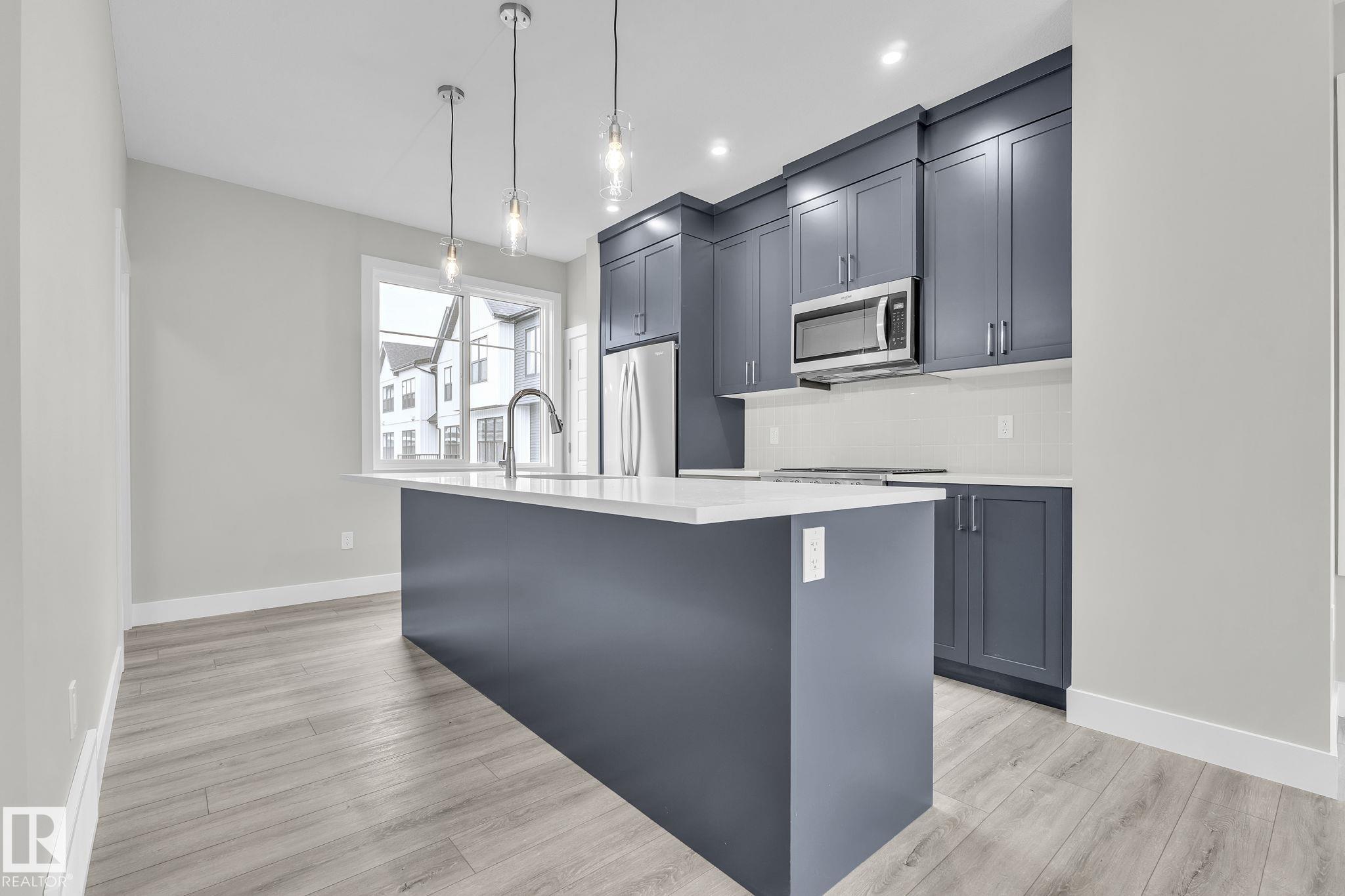 Photo 2 at 9 - 6905 25 Avenue SW, The Orchards At Ellerslie, Edmonton