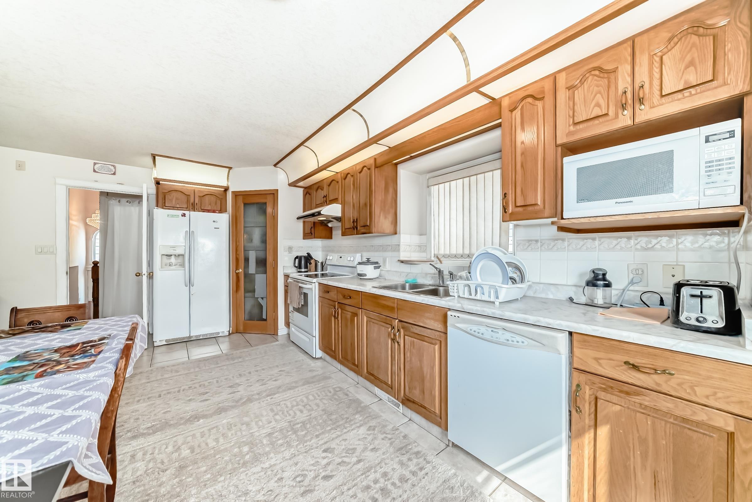 Photo 10 at 3135 34b Avenue NW, Wild Rose, Edmonton