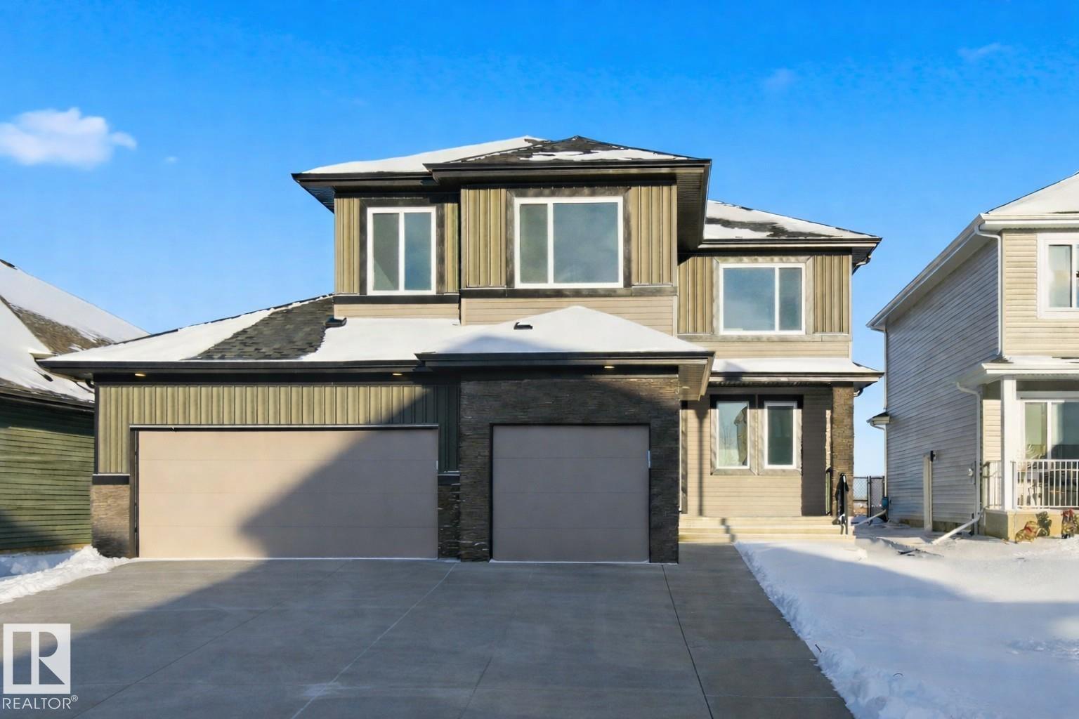 Executive family living in Stony Plain's most prestigious subdivision! This brand new 2700 sq ft PLUS fully finished basement 2-storey is the perfect place to call home. Open concept main floor with beautiful white kitchen, quartz countertops & huge pantry. Appliance allowance included. Great dining area to host family & friends! Massive living room with towering ceilings, loads of windows & electric fireplace. Front den is perfect home office! Upstairs master suite features tons of space, 5pc ensuite & large walk in closet! 2 more bedrooms are perfect for kids or guests. UPSTAIRS LAUNDRY! Fully finished basement features massive rec room with wet bar, perfect for a home movie night with a great spot for a pool table too! 4th bedroom too! Triple attached garage is fully insulated! Great location backing onto a greenspace & walking path. Close to restaurants & shopping. some photos are virtually staged