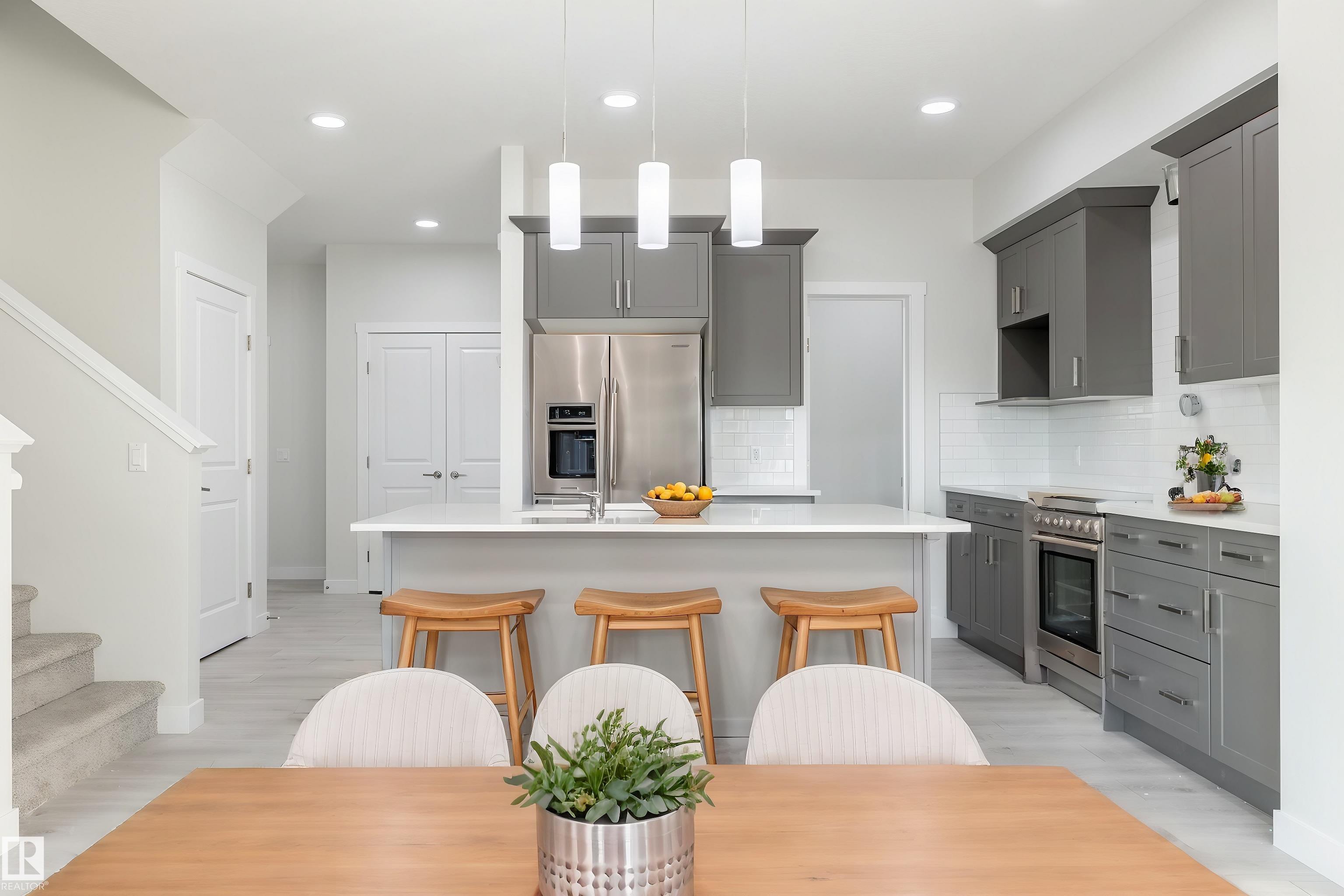 Photo 3 at 403 157 Avenue NE, Quarry Ridge, Edmonton