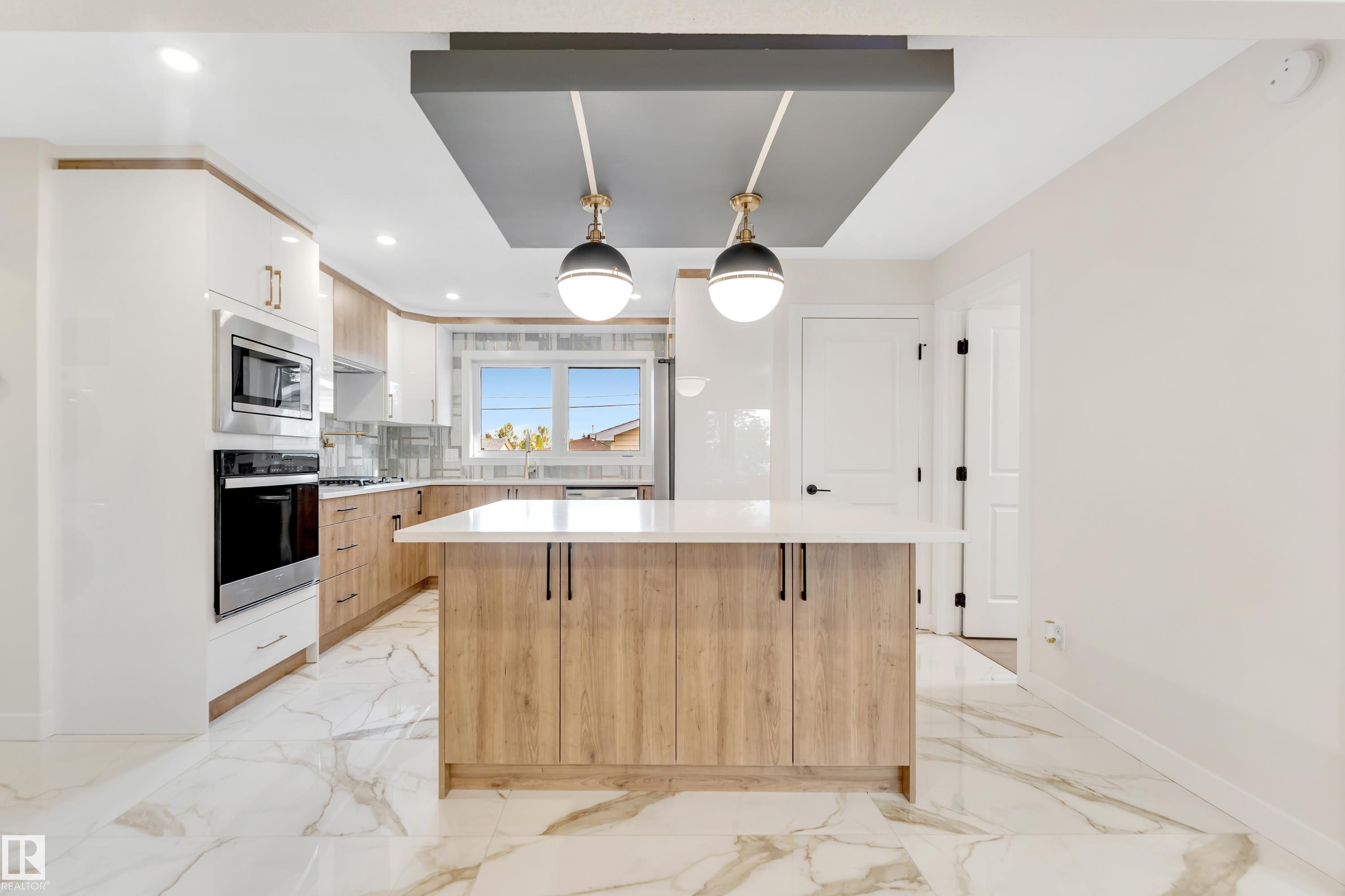 Photo 7 at 5907 137 Avenue NW, Belvedere, Edmonton