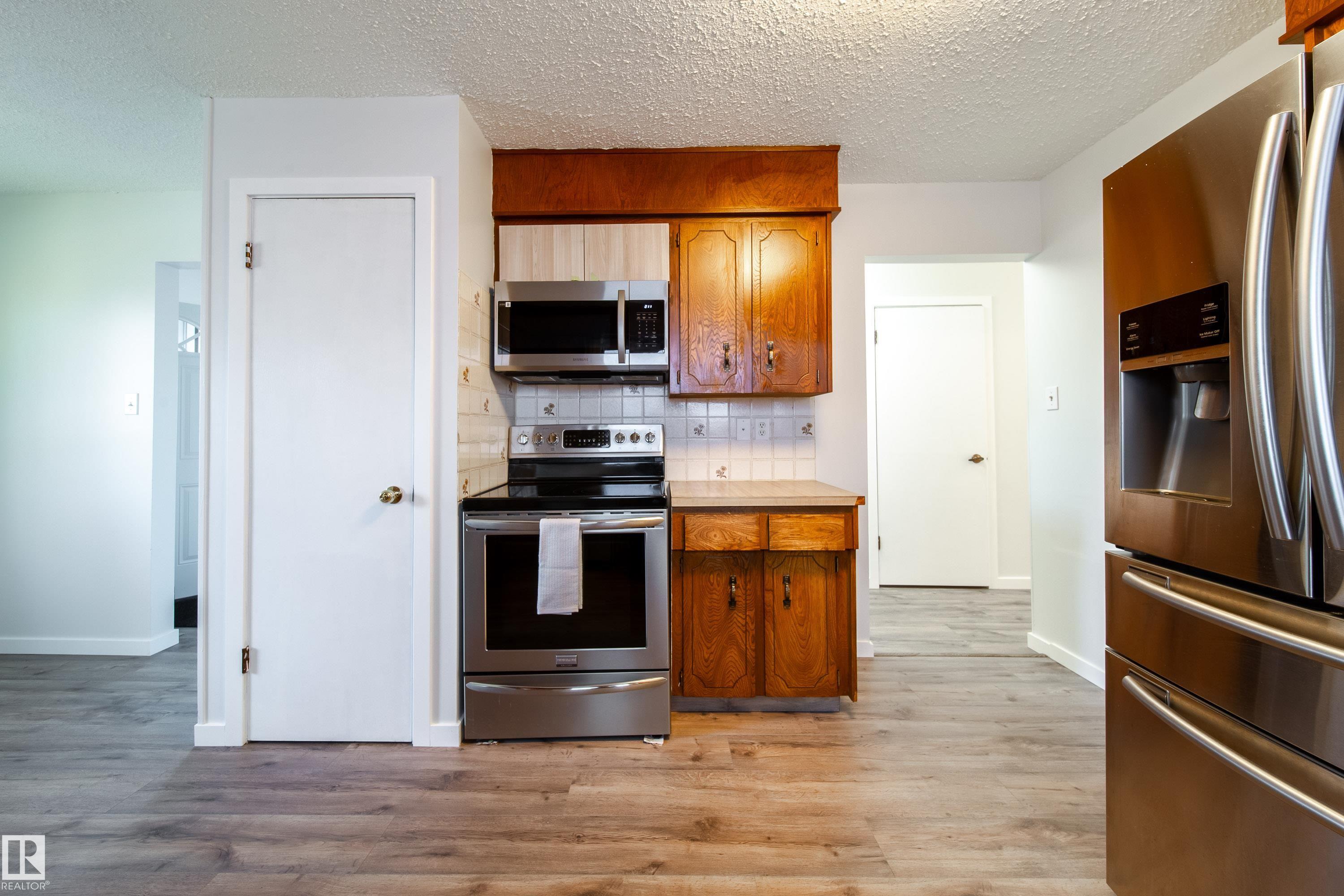 Photo 15 at 14511 21 Street NW, Fraser, Edmonton