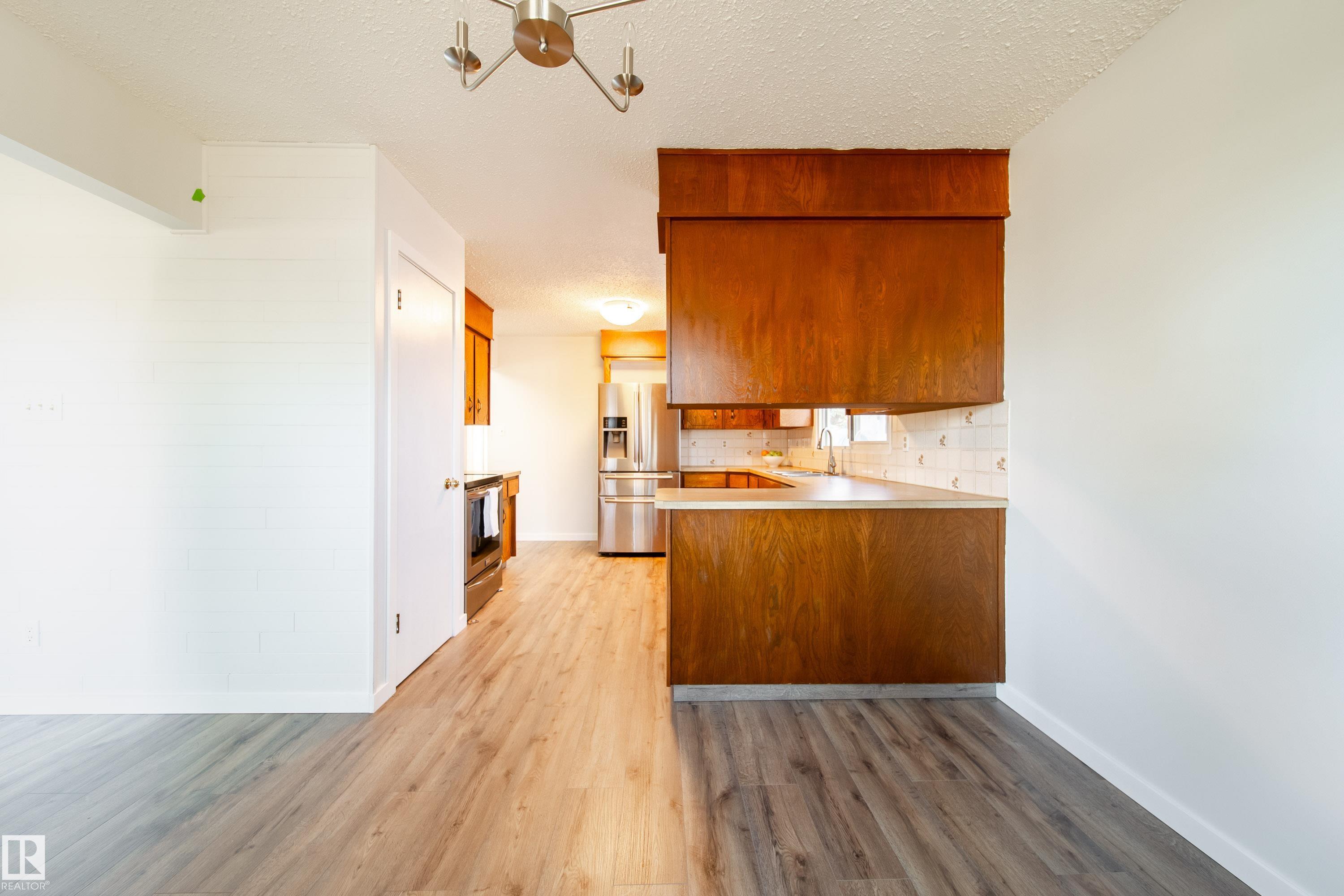 Photo 10 at 14511 21 Street NW, Fraser, Edmonton