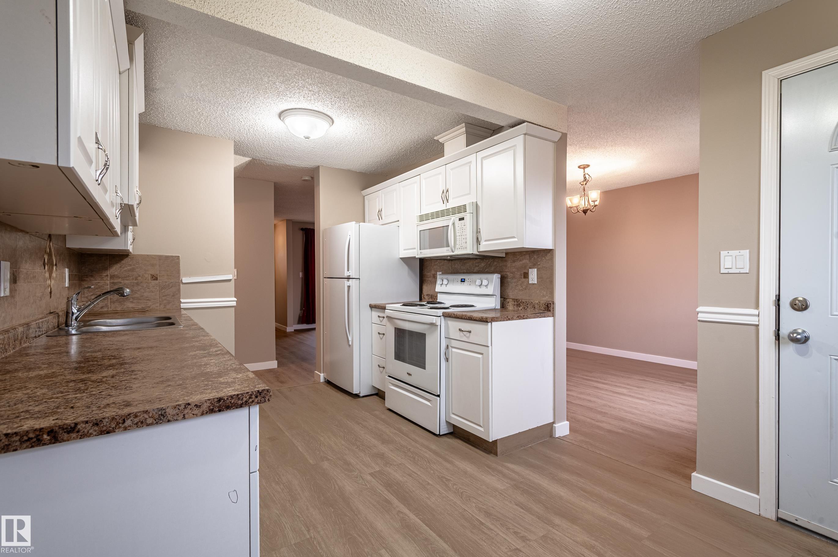 Photo 15 at 14707 25 Street NW, Fraser, Edmonton