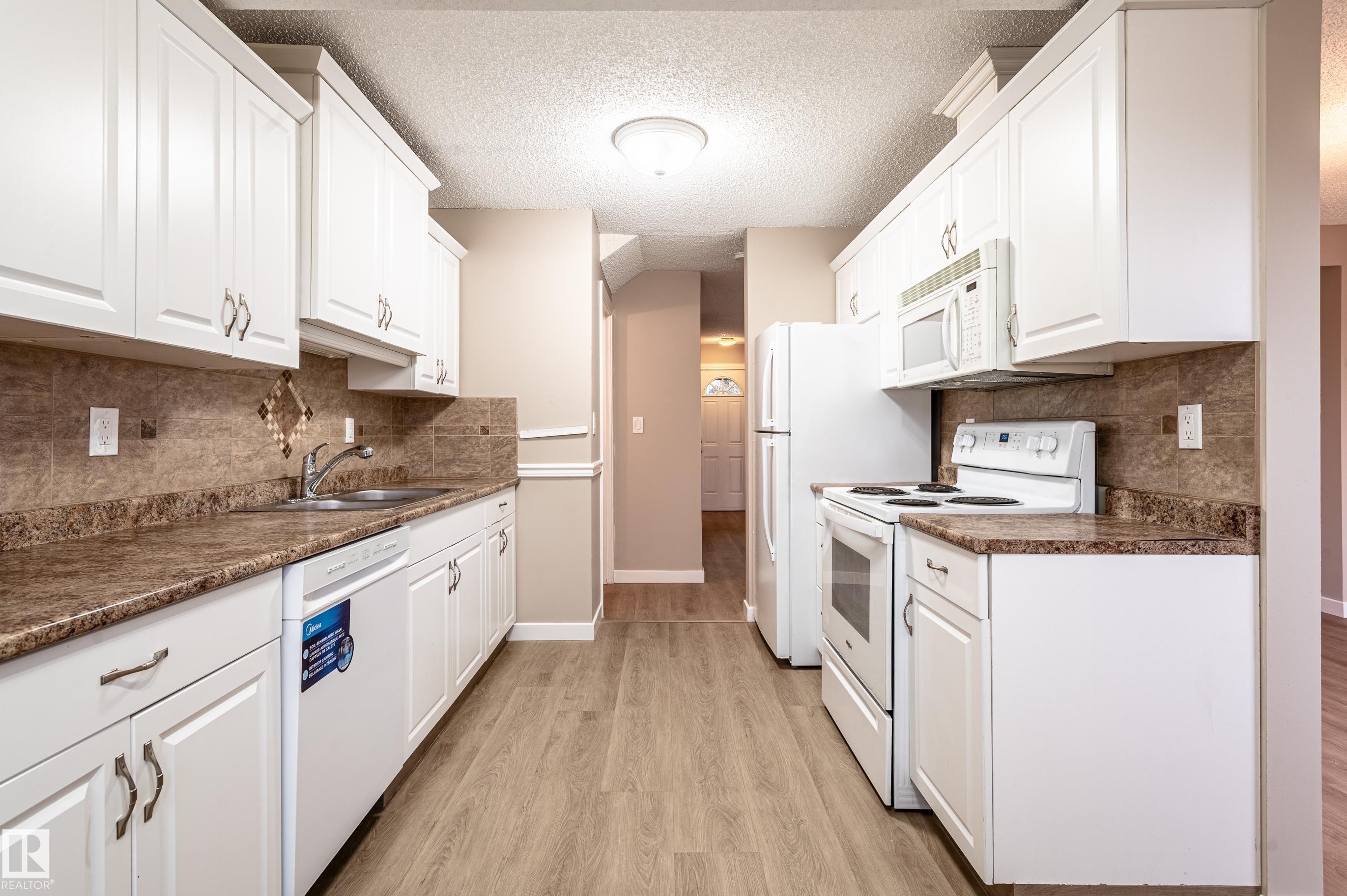 Photo 16 at 14707 25 Street NW, Fraser, Edmonton