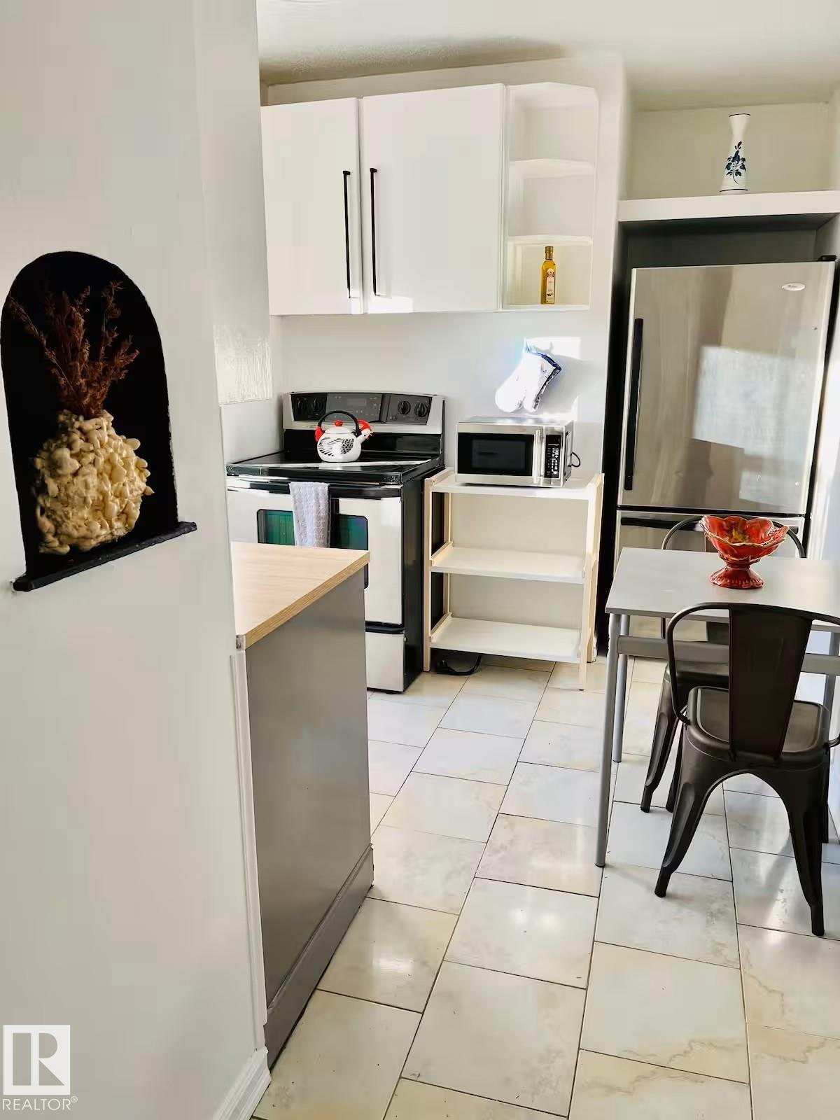 Photo 15 at 10711 76 Avenue NW, Queen Alexandra, Edmonton