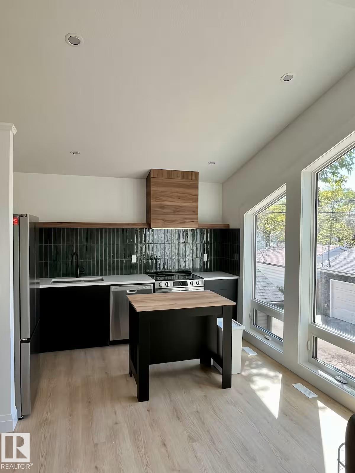 Photo 7 at 10711 76 Avenue NW, Queen Alexandra, Edmonton