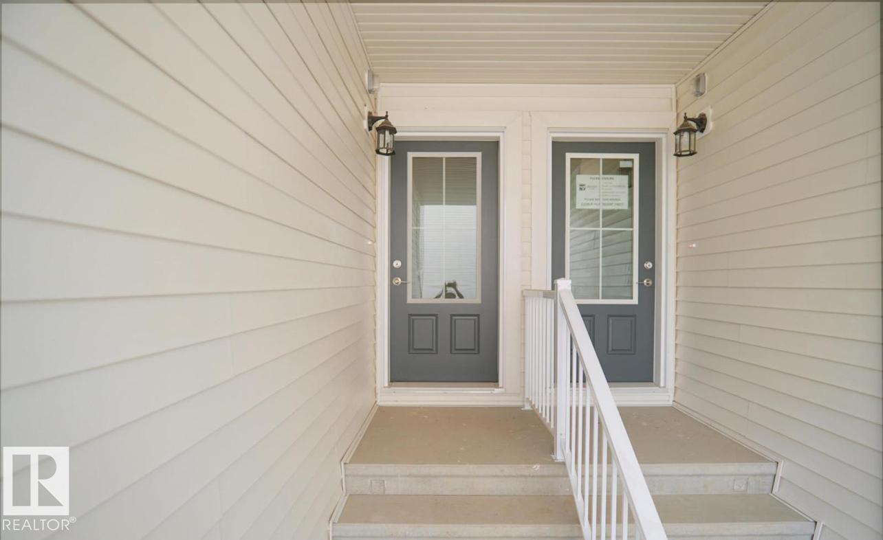 Photo 2 at 19 -  7110 Keswick Common SW, Keswick, Edmonton