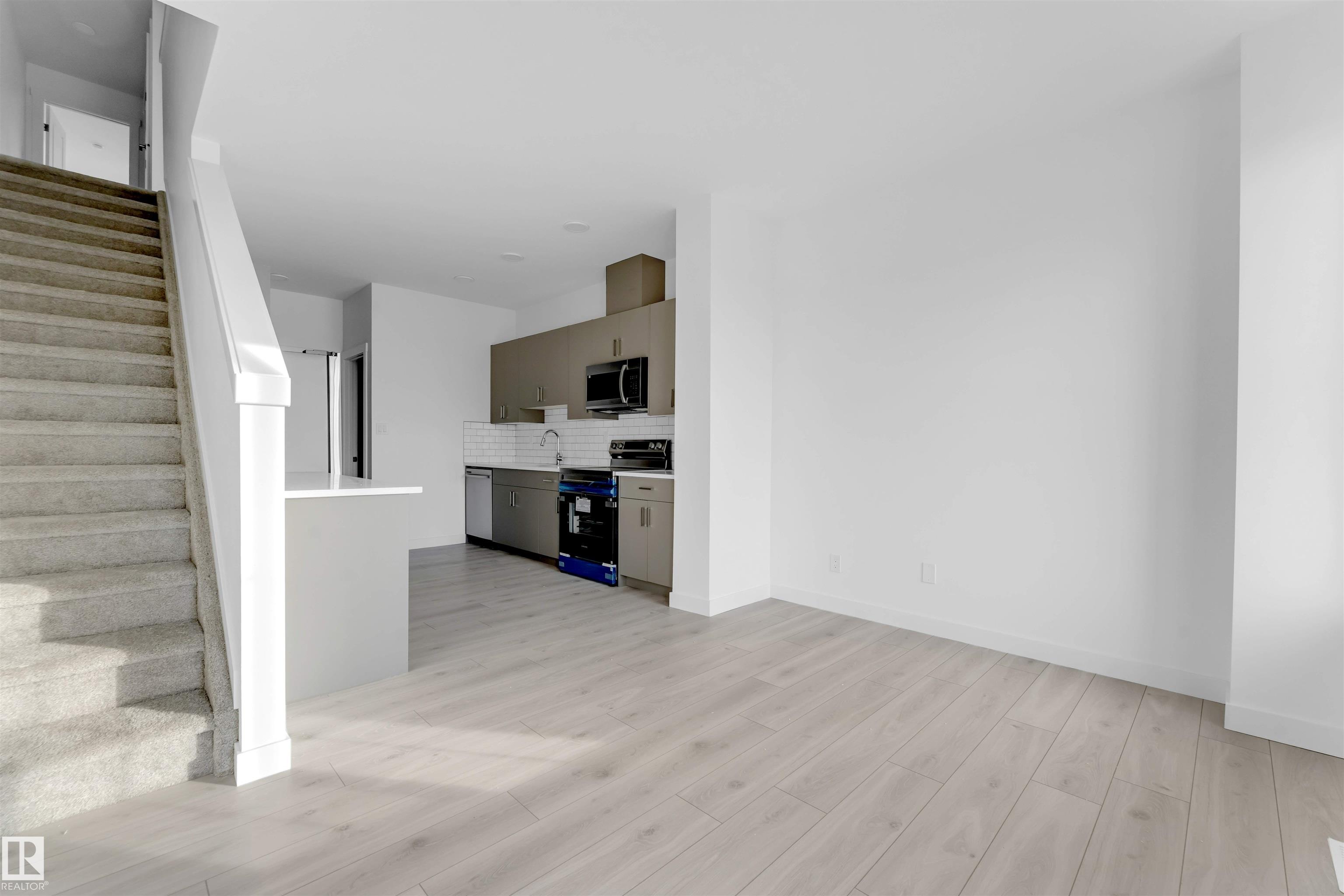 Photo 11 at 19 -  7110 Keswick Common SW, Keswick, Edmonton