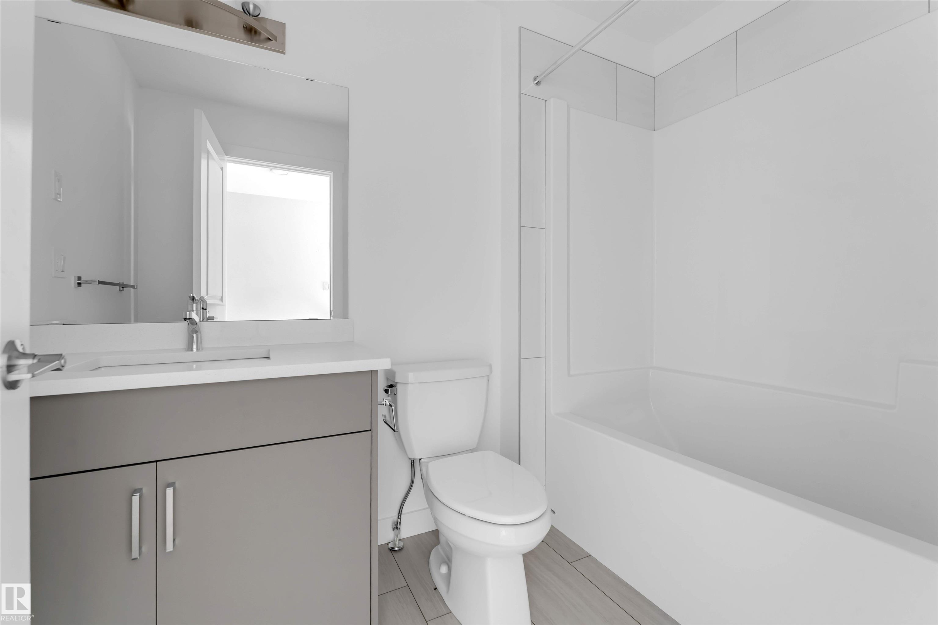 Photo 13 at 19 -  7110 Keswick Common SW, Keswick, Edmonton