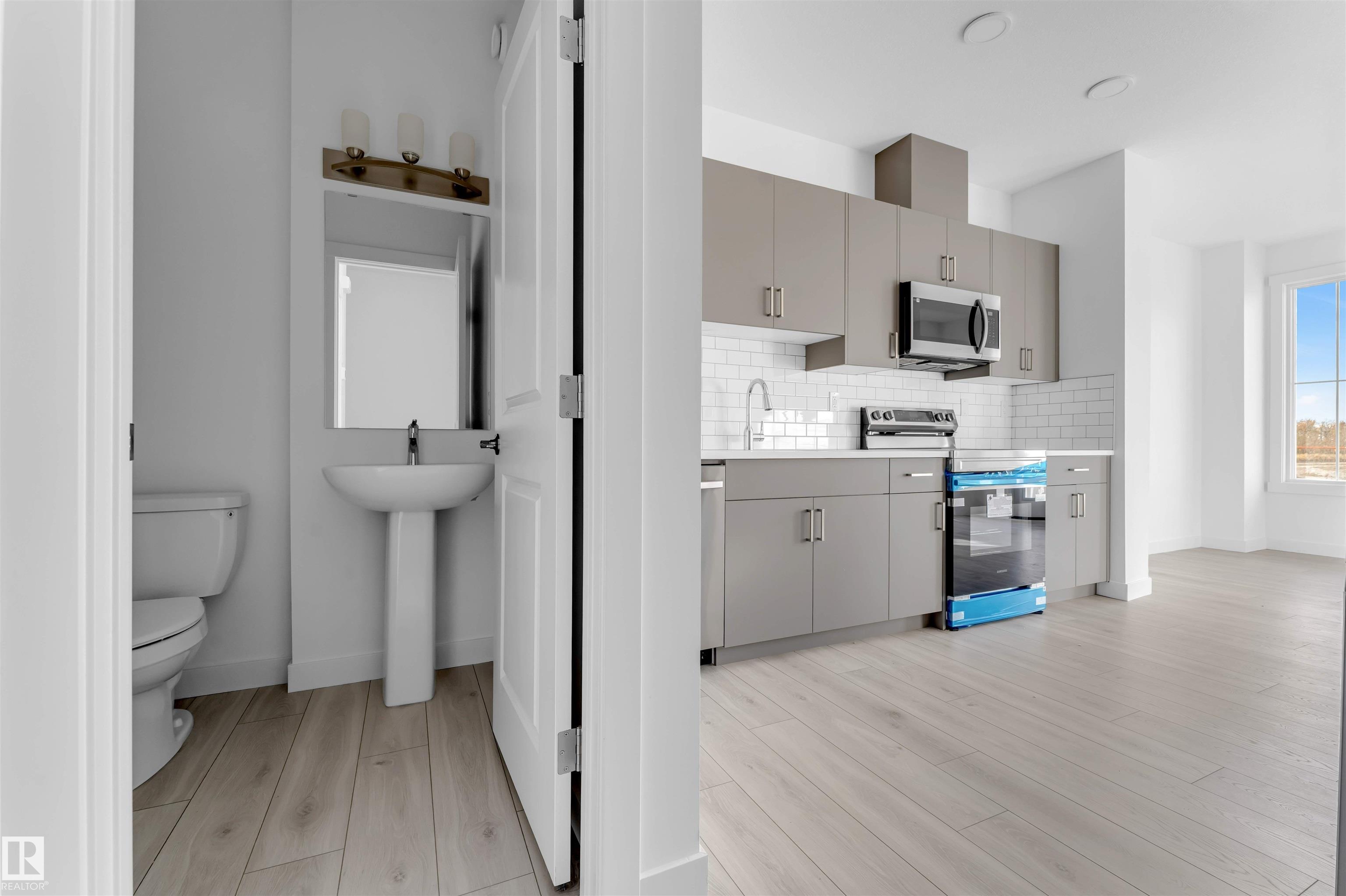 Photo 4 at 19 -  7110 Keswick Common SW, Keswick, Edmonton