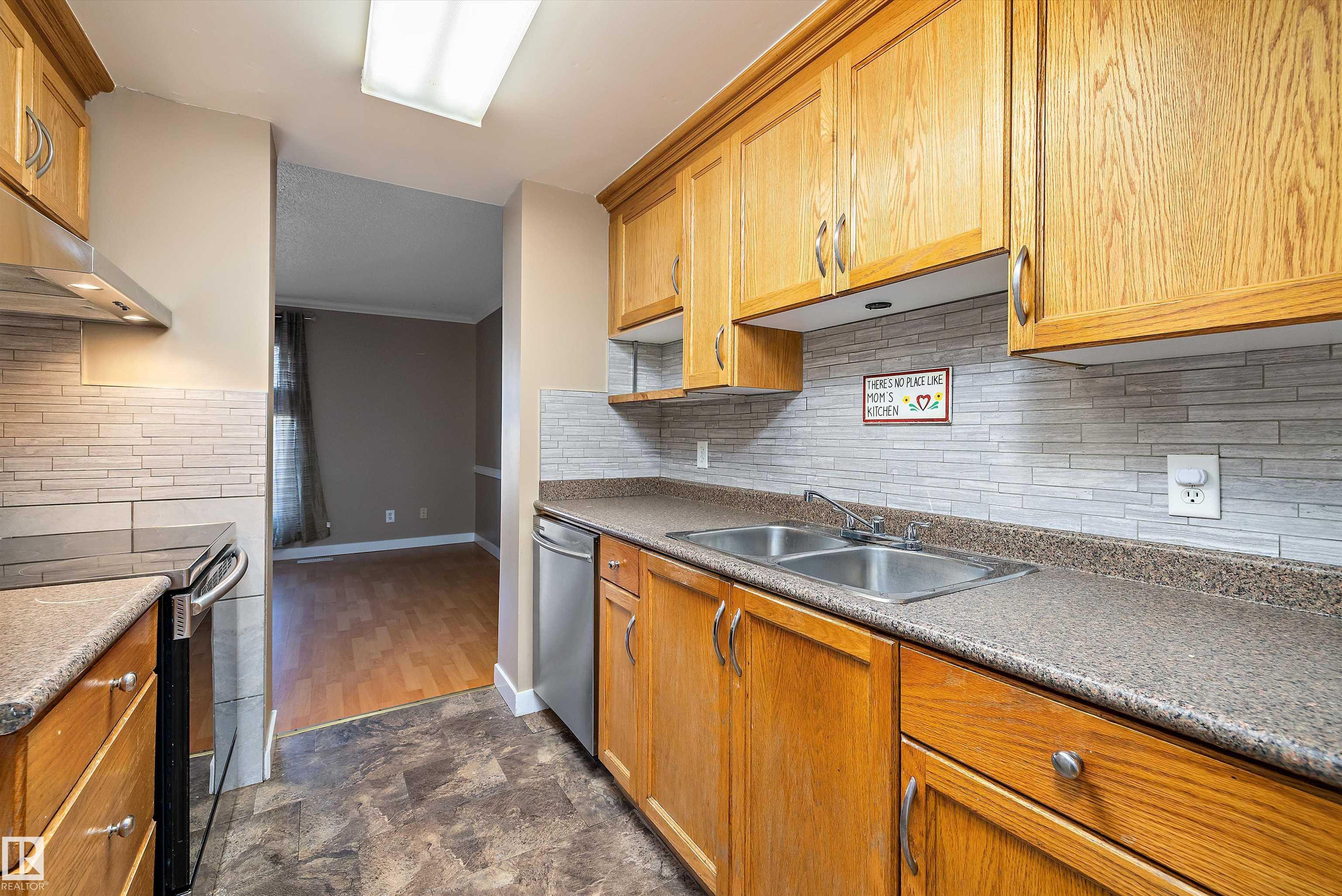 Photo 8 at 163 Abbottsfield Road NW, Abbottsfield, Edmonton