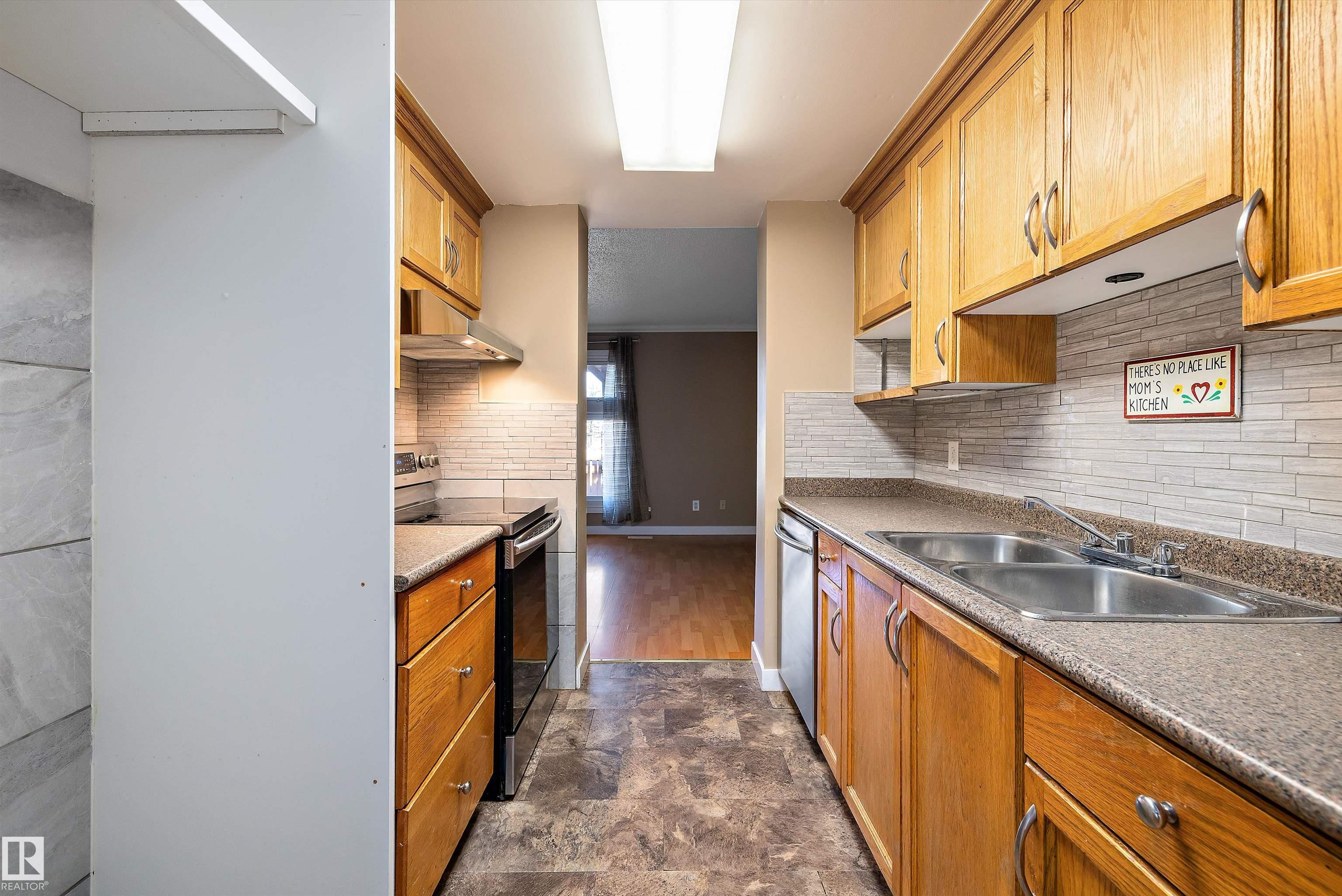 Photo 9 at 163 Abbottsfield Road NW, Abbottsfield, Edmonton