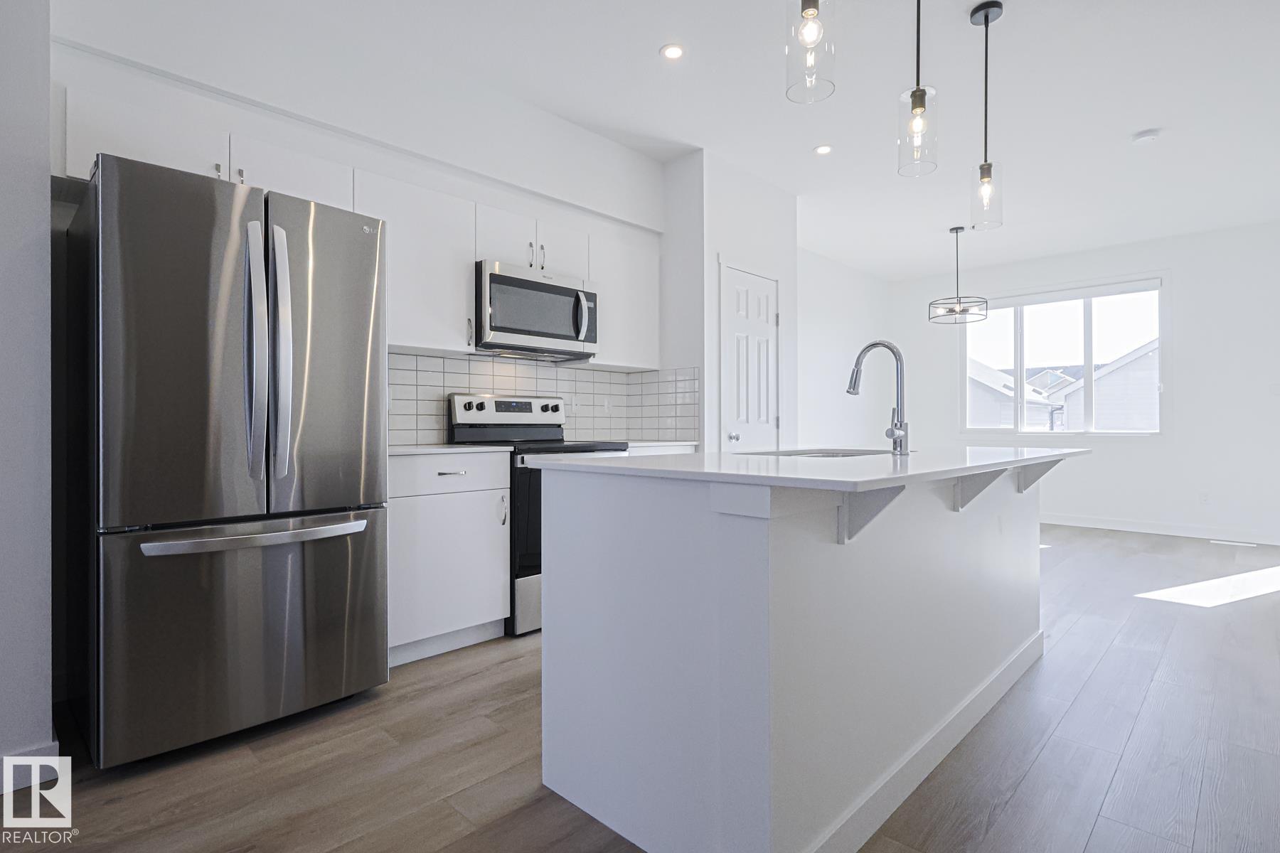 Photo 2 at 6347 King Wynd SW, Keswick, Edmonton