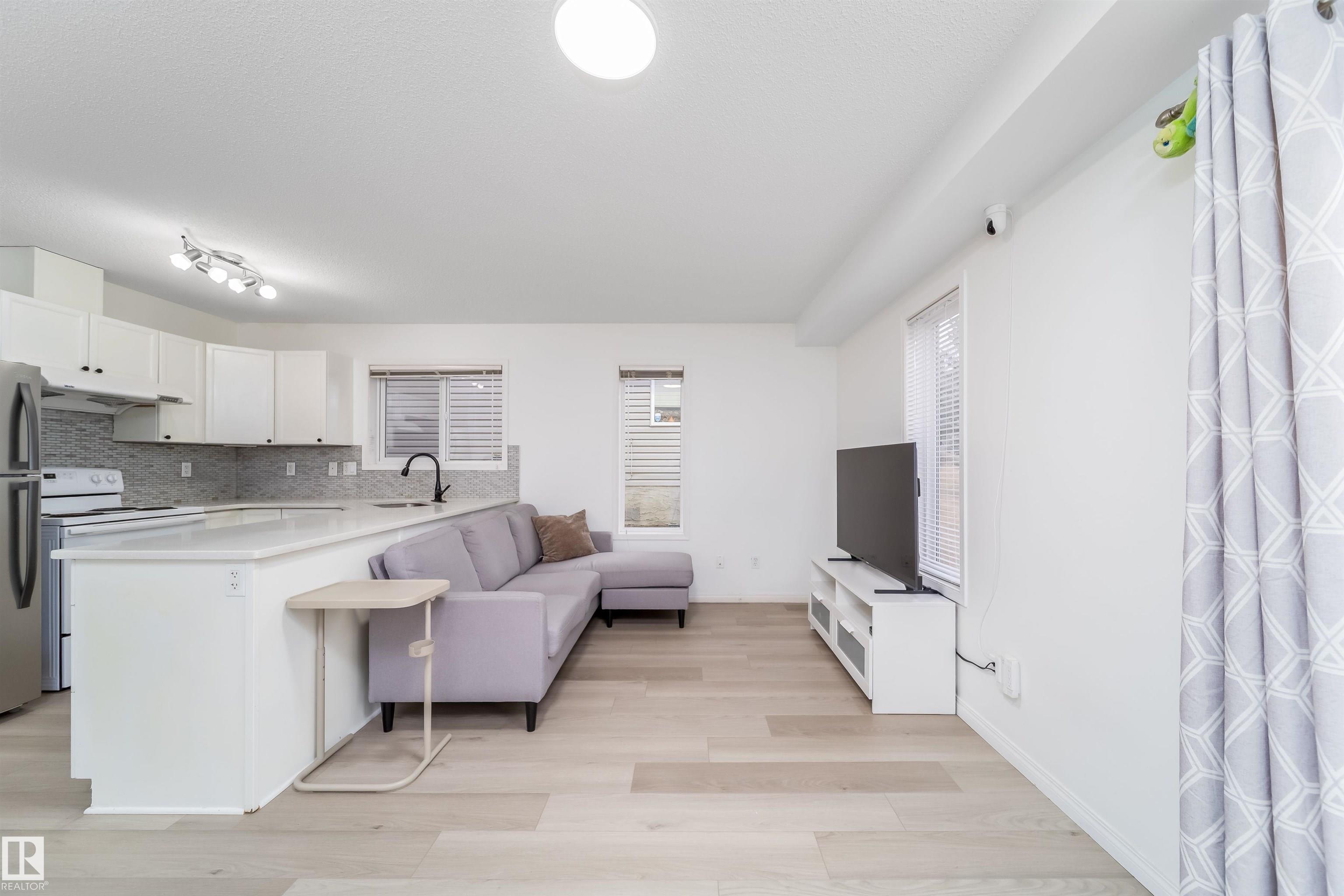 Photo 7 at 30 - 130 Hyndman Crescent NW, River Valley Hermitage, Edmonton