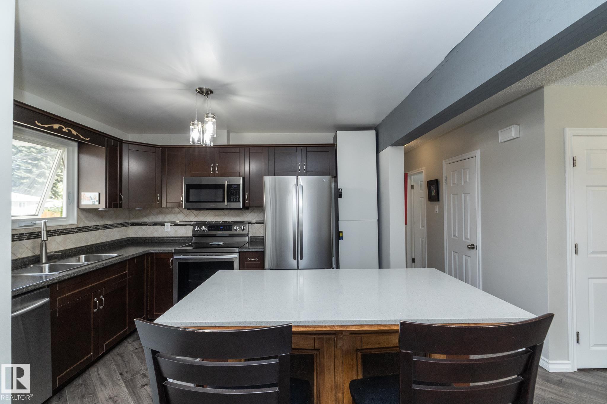 Photo 3 at 3418 120 Avenue NW, Beacon Heights, Edmonton