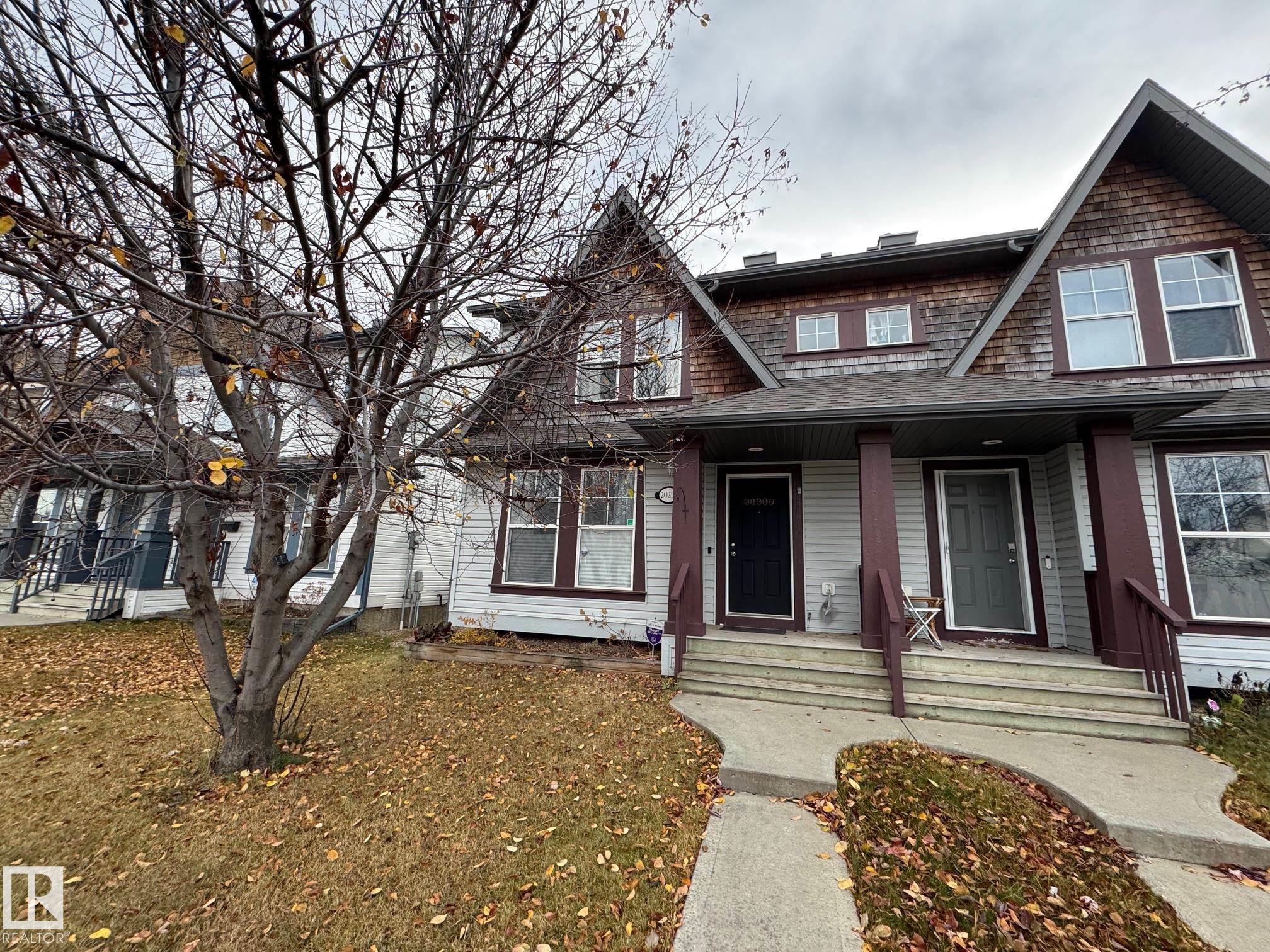 Lovely two story half duplex in The Hamptons with (No Condo Fees)!  Double garage that is drywalled and insulated. Home has a bright open floor plan with a sunny South backyard. Kitchen is spacious with lots of cabinets and even has an island and closet pantry!  (fridge replaced 2024)  Large patio door from the dining area leads you out to your large South facing deck and yard. Main floor also has a large living room and a two piece powder room. The upper floor is where you will find the large primary bedroom with a three piece ensuite and walk in closet!  Another 4 piece bathroom is also on the upper floor leading to another two bedrooms that were converted to one larger bedroom.. This can easily be converted back to three bedrooms!  Home has vinyl plank flooring throughout so no carpet. The basement is where you will find the laundry area and roughed in plumbing for a fourth bathroom and potential for another bedroom if you desire. Shingles are approximately 5 years old. Great Neighbors Too!