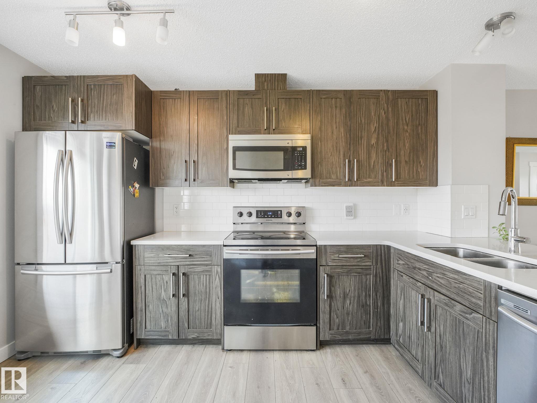 Photo 4 at 648 Lewis Greens Drive NW, Stewart Greens, Edmonton