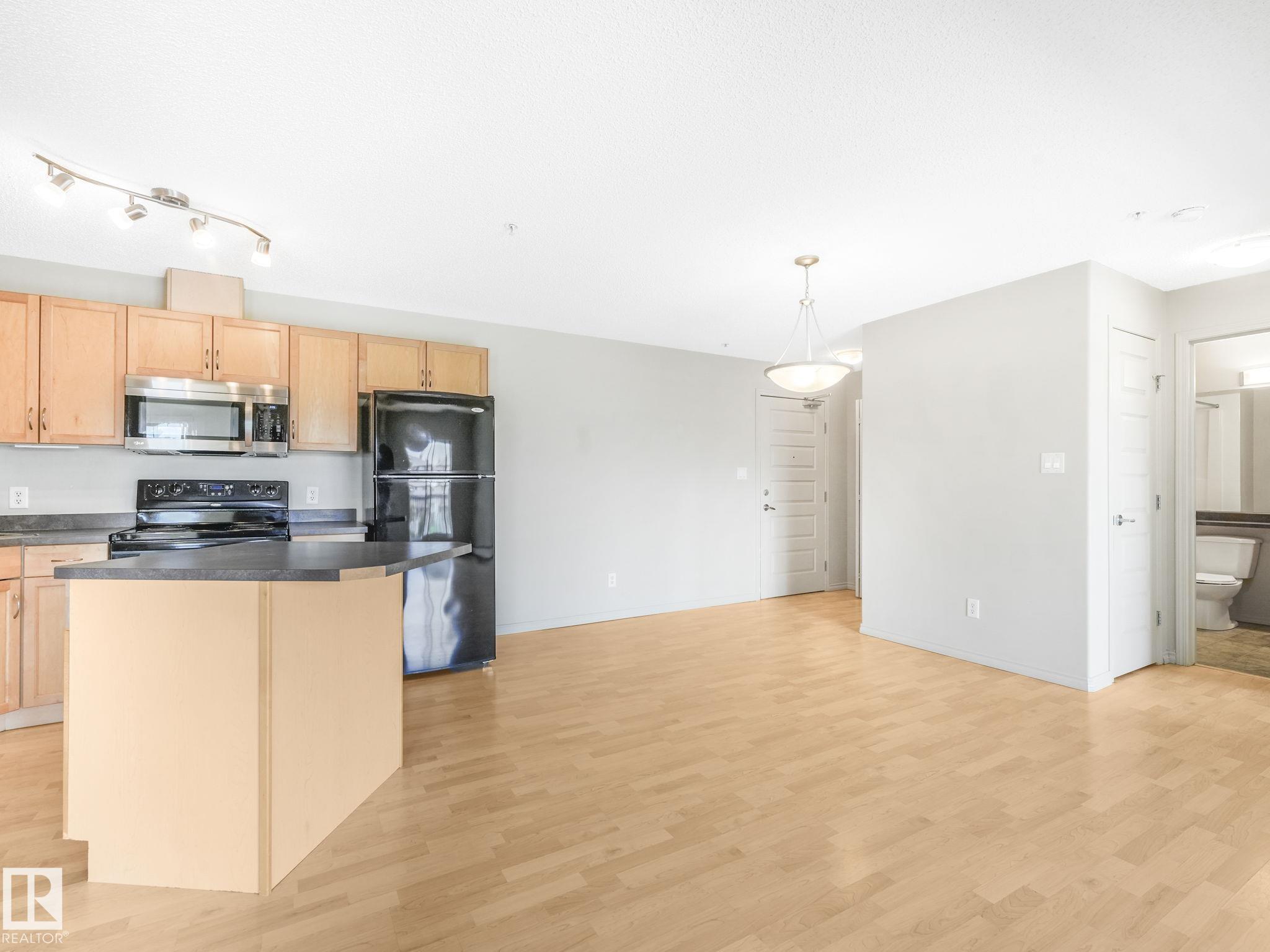 Photo 10 at 209 - 646 Mcallister Loop SW, Macewan, Edmonton