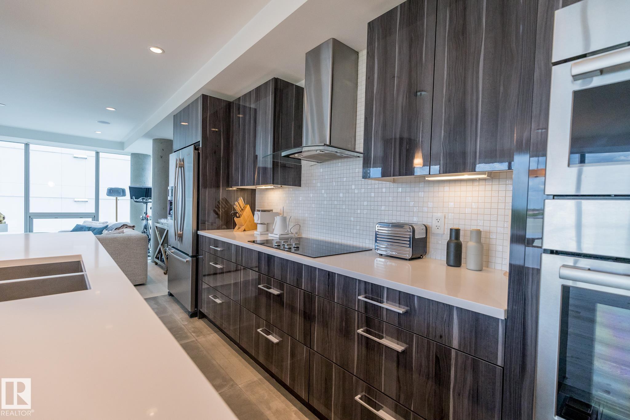 Photo 5 at 601 - 11969 Jasper Avenue NW, Wîhkwêntôwin, Edmonton