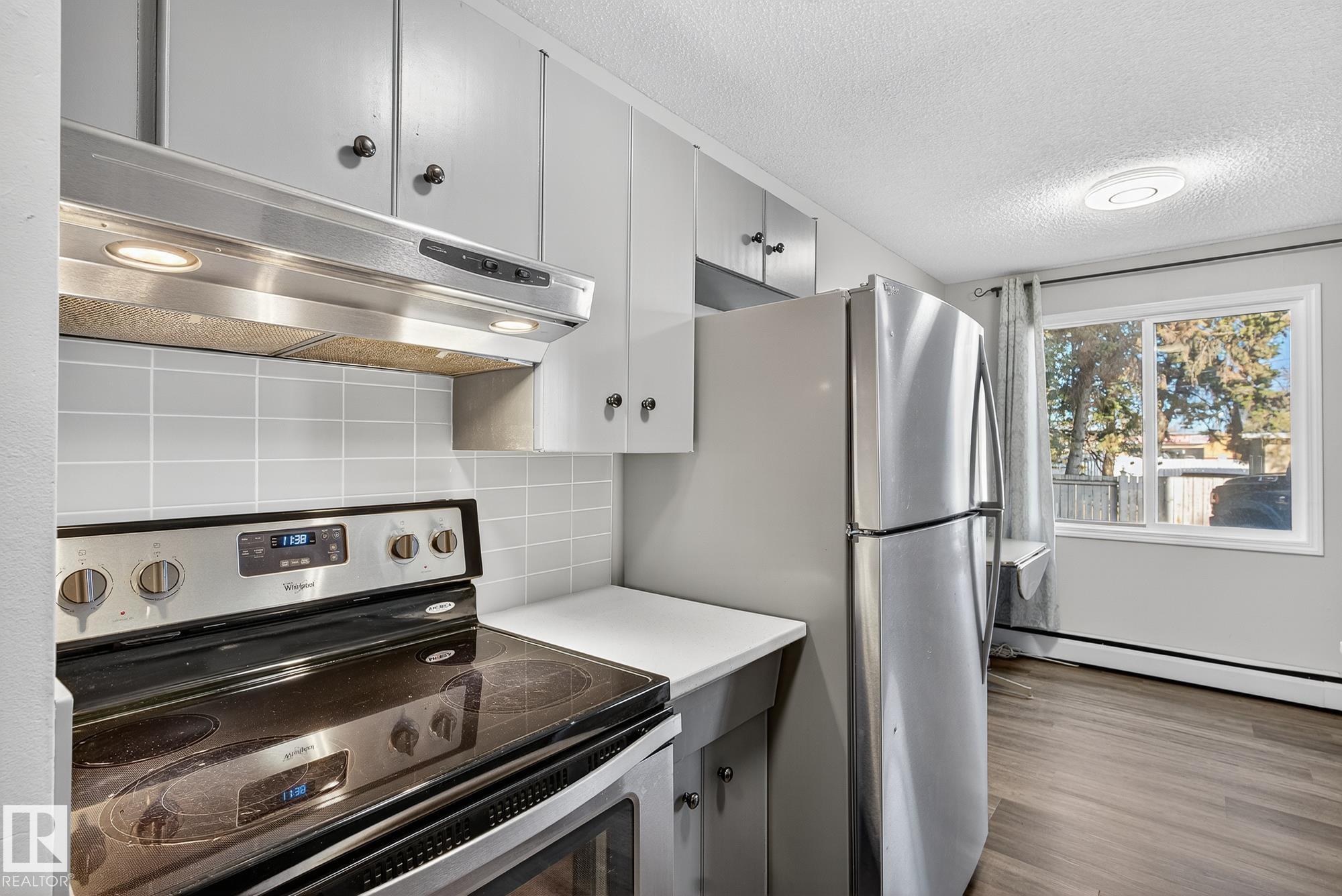 Photo 4 at 6 - 10035 155 Street NW, West Jasper Place, Edmonton