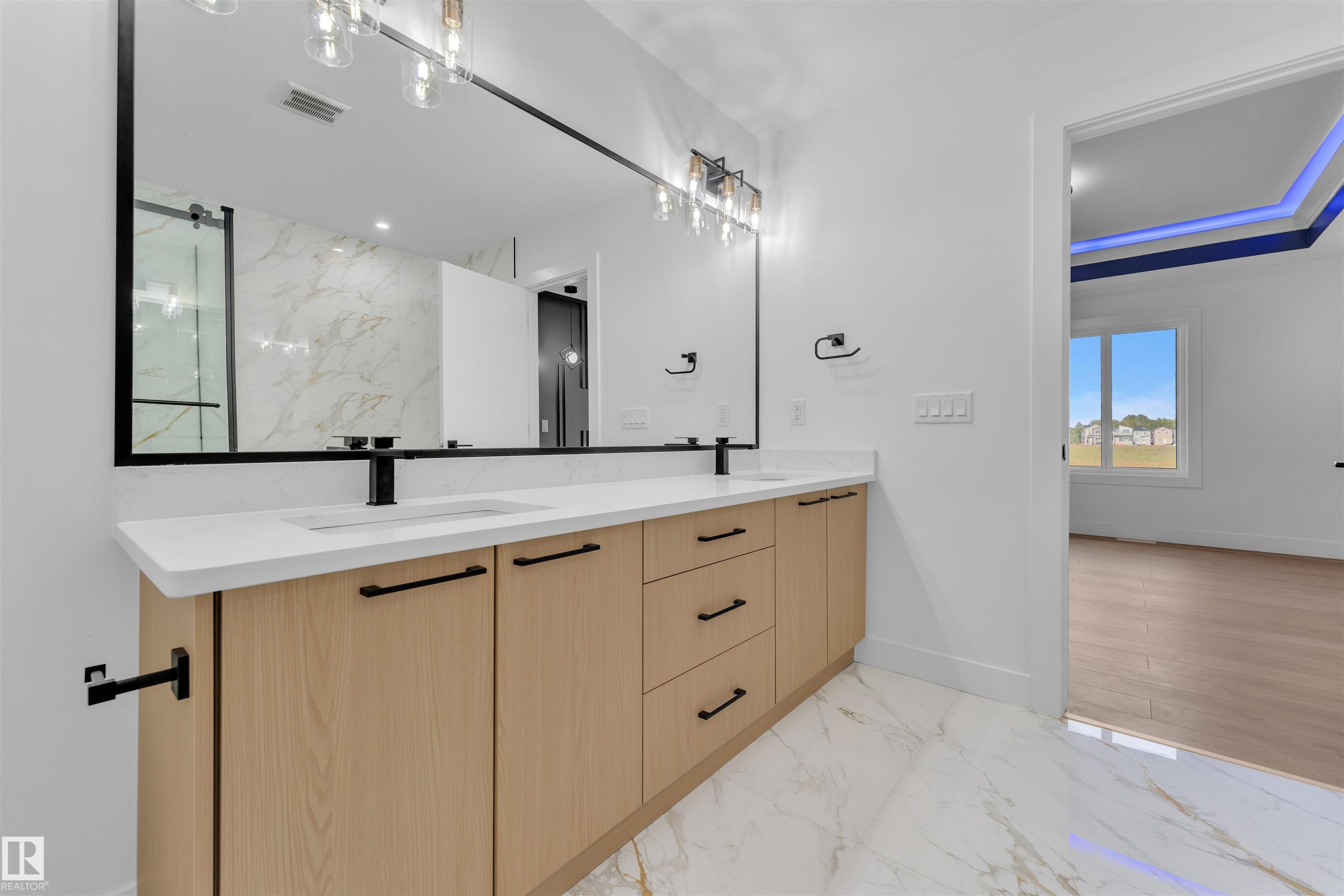 Photo 32 at 107 28 Street SW, Alces, Edmonton