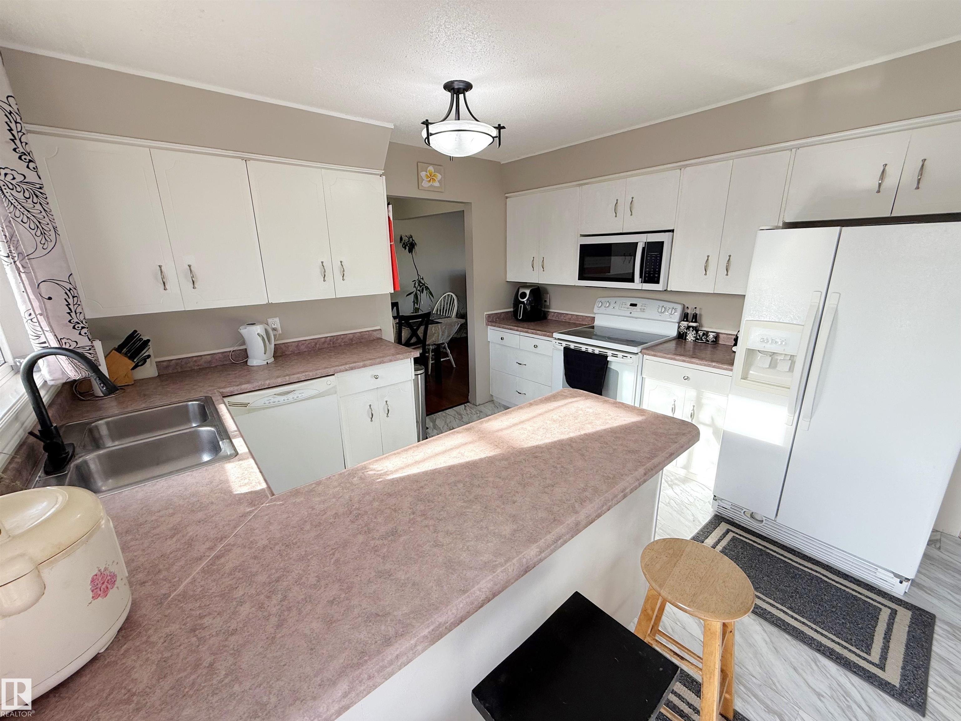 Photo 13 at 3717 136a Avenue NW, Belmont, Edmonton