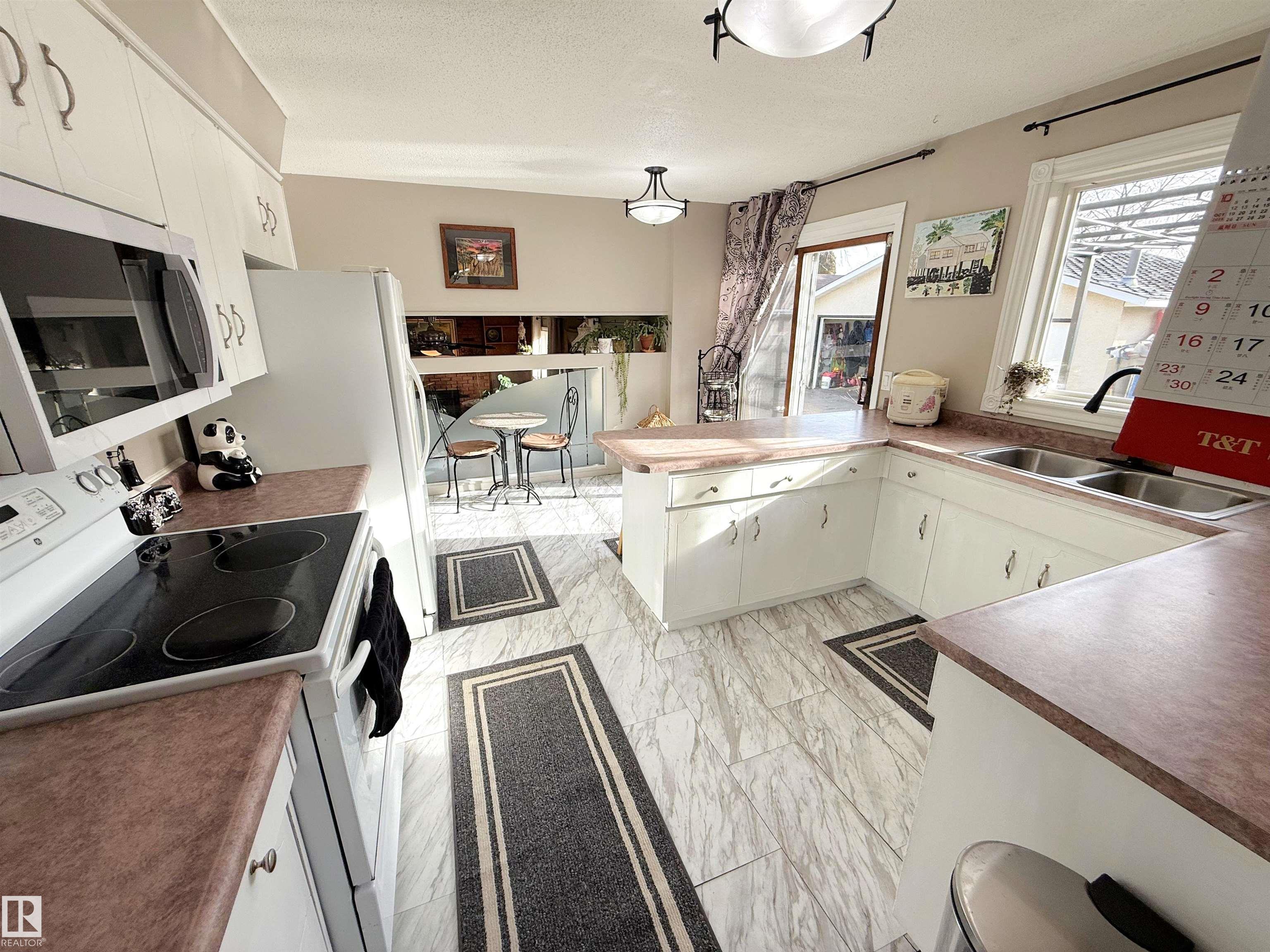 Photo 14 at 3717 136a Avenue NW, Belmont, Edmonton