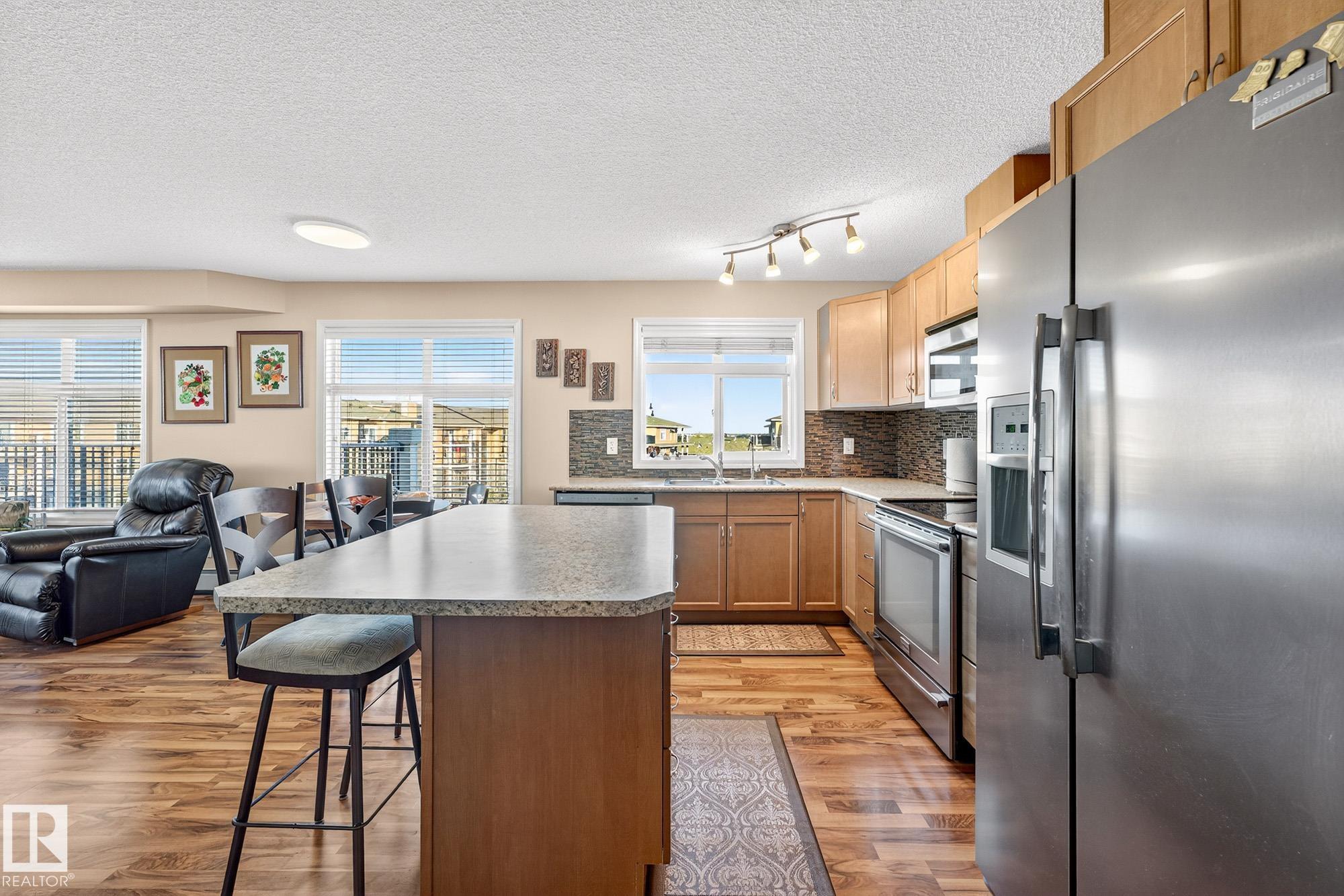 Photo 6 at 402 - 6070 Schonsee Way NW, Schonsee, Edmonton