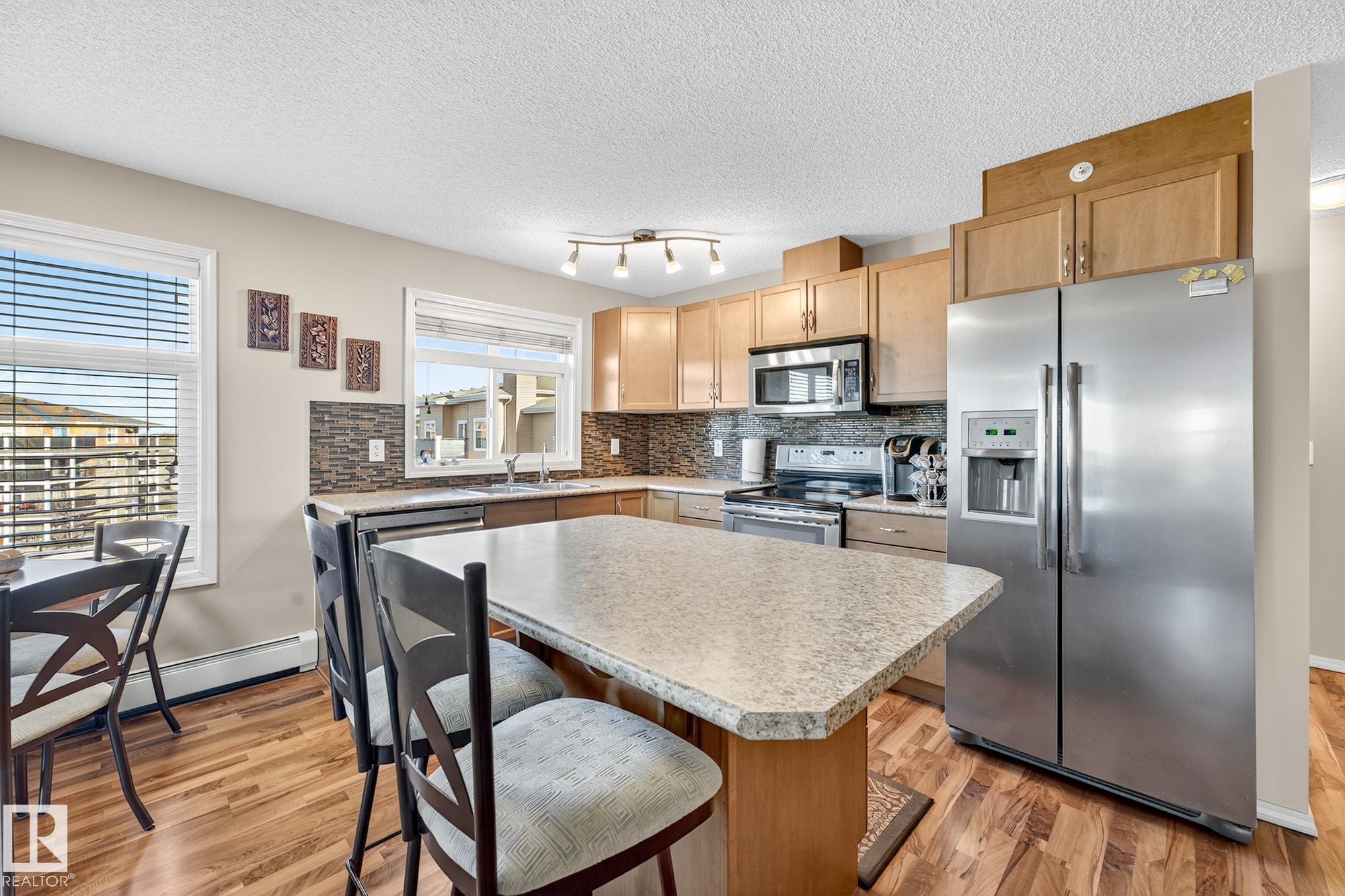Photo 7 at 402 - 6070 Schonsee Way NW, Schonsee, Edmonton