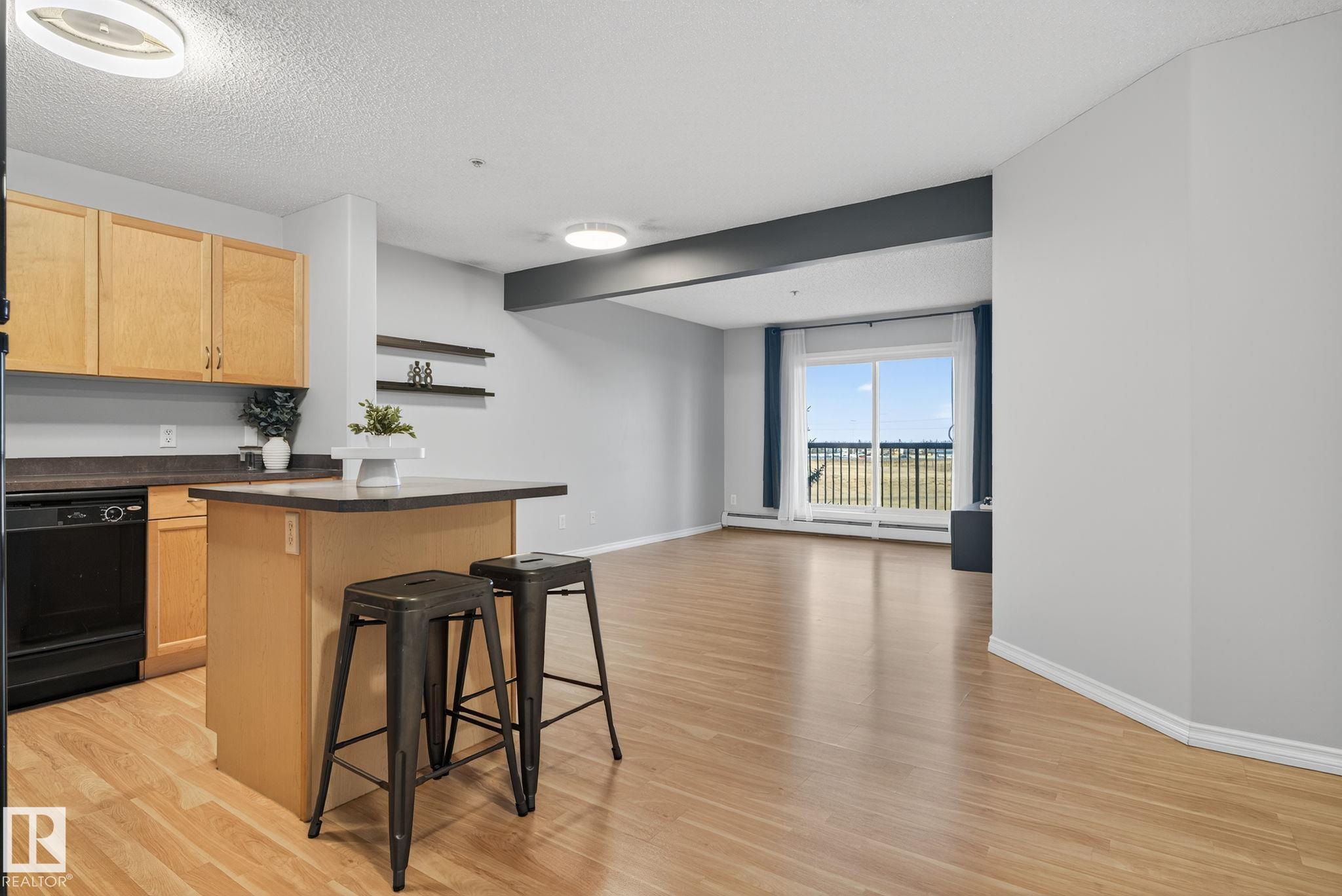 Photo 7 at 310 - 646 Mcallister Loop SW, Macewan, Edmonton