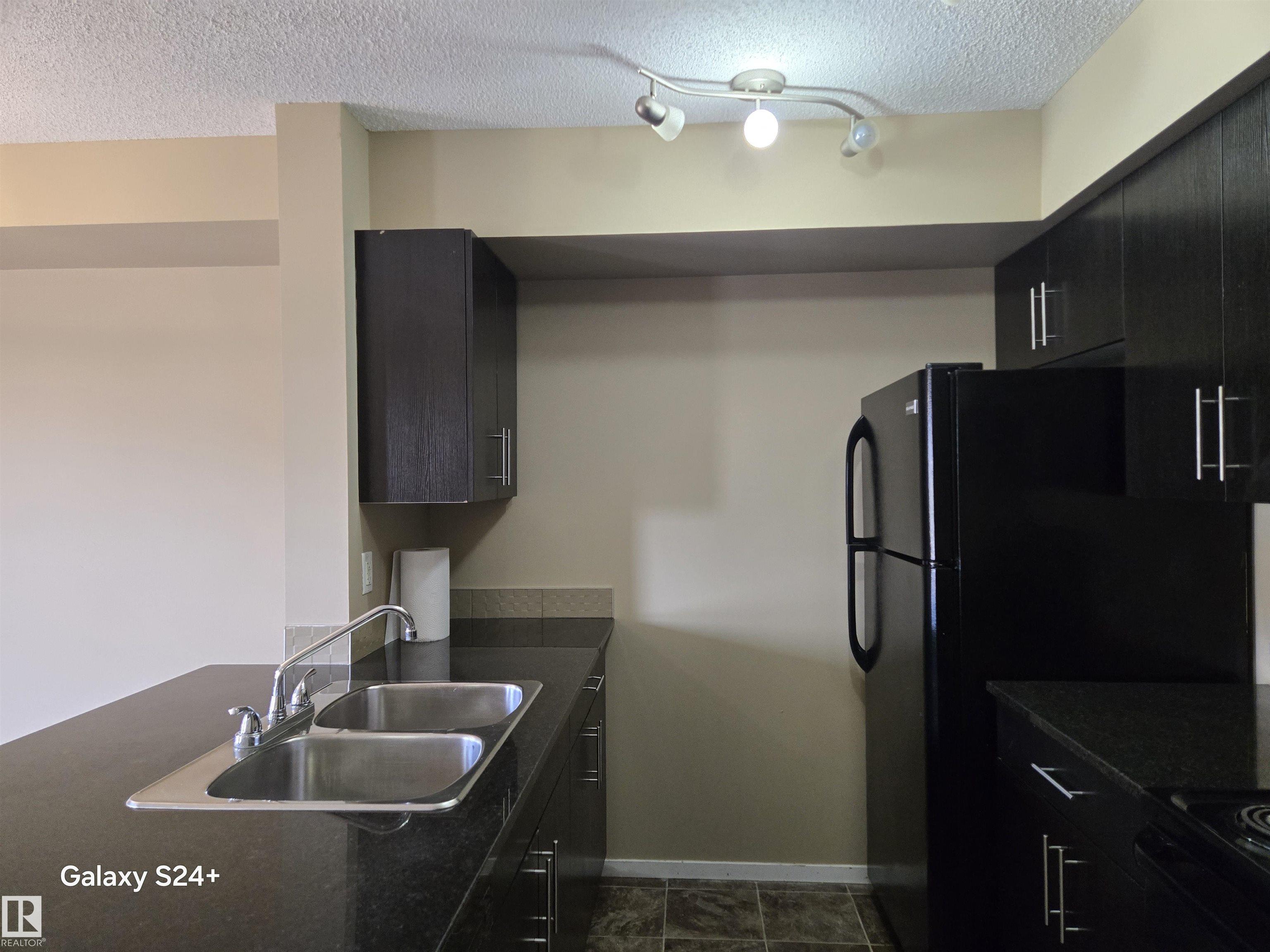 Picture for #310 3207 JAMES MOWATT TR SW