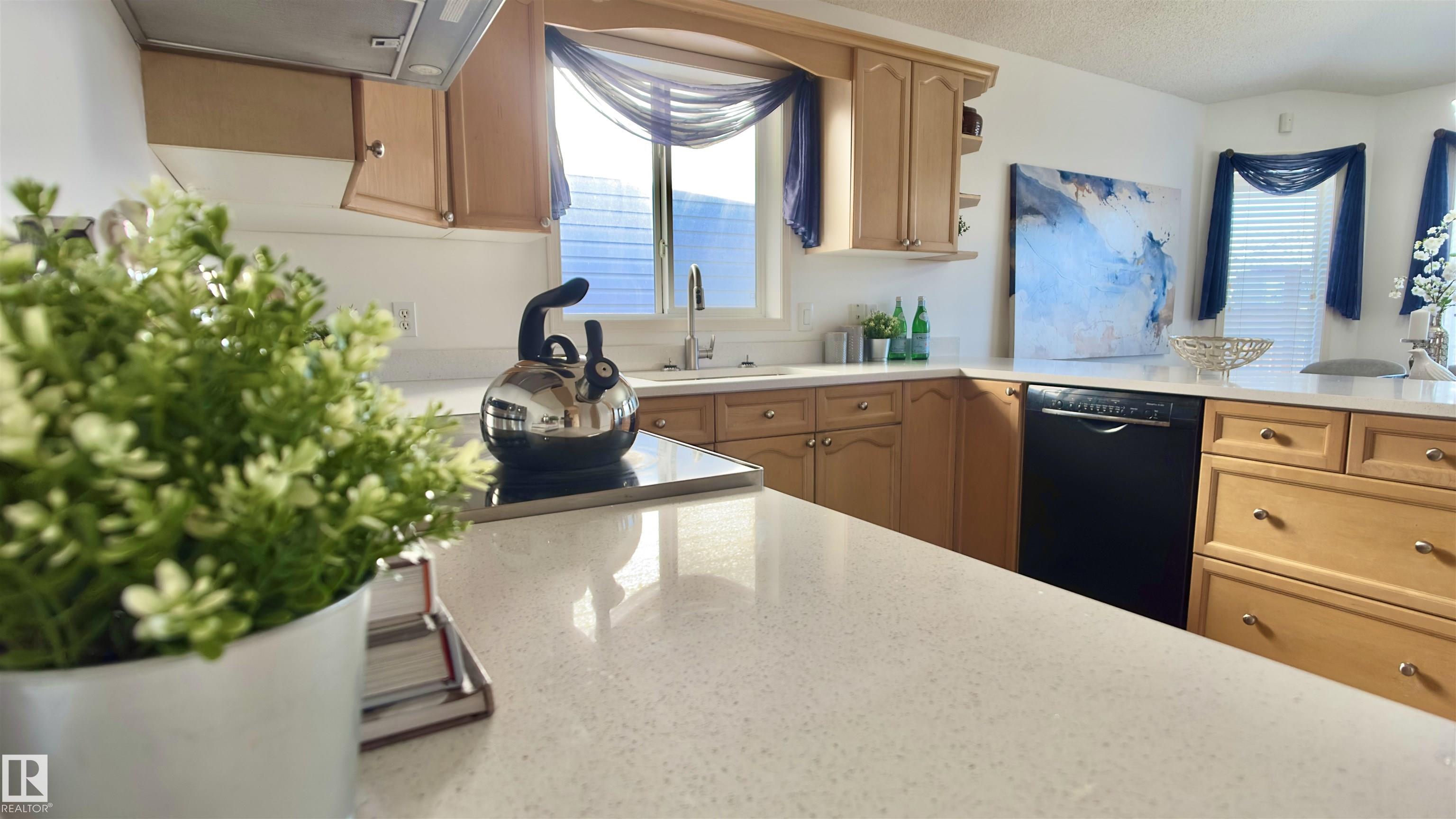 Photo 4 at 13023 35 Street NW, Belmont, Edmonton