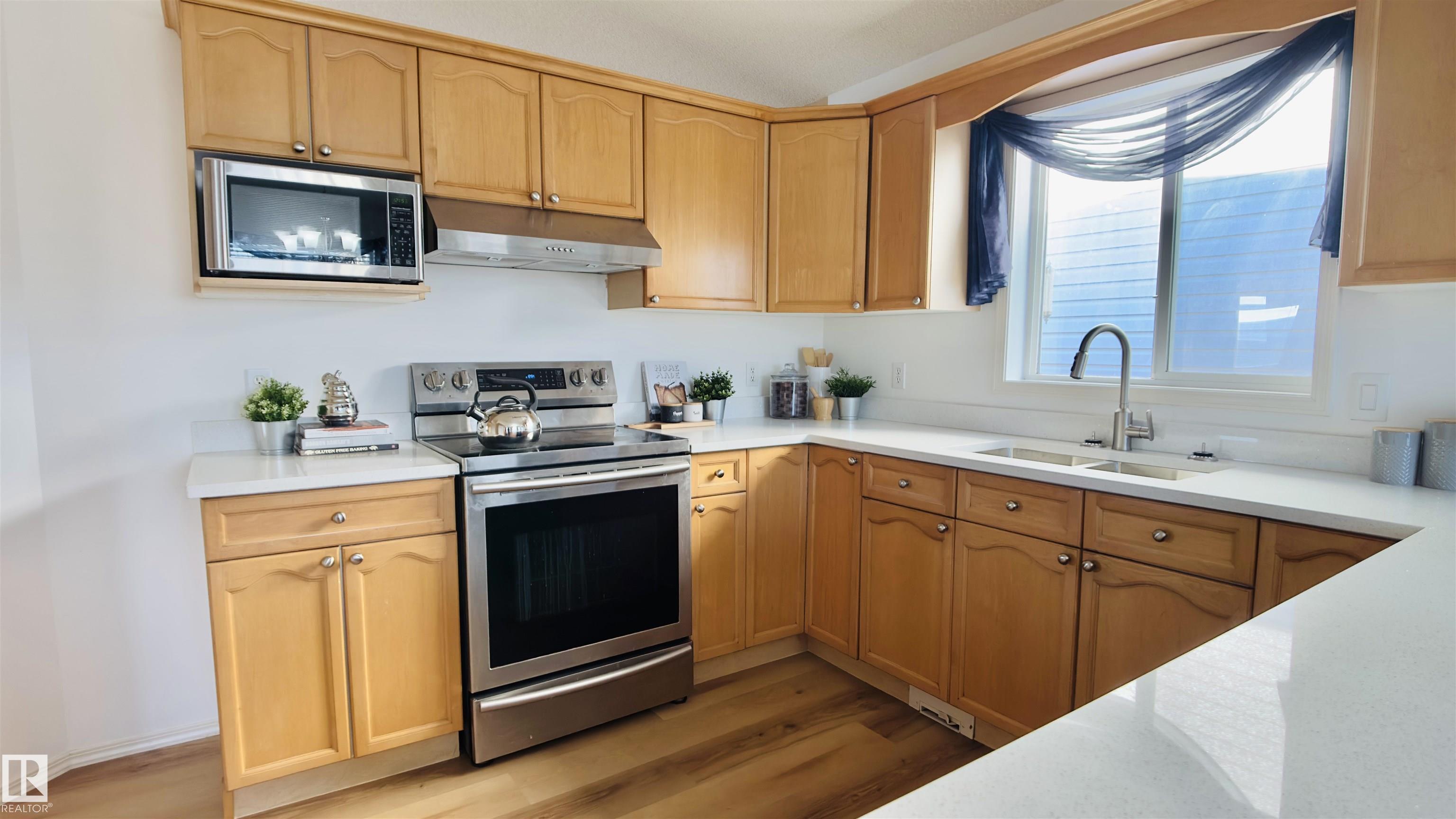 Photo 5 at 13023 35 Street NW, Belmont, Edmonton