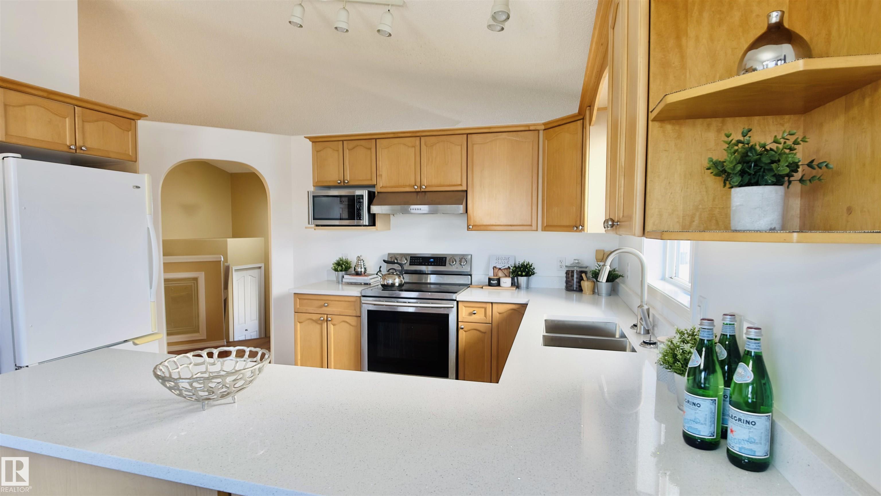 Photo 6 at 13023 35 Street NW, Belmont, Edmonton