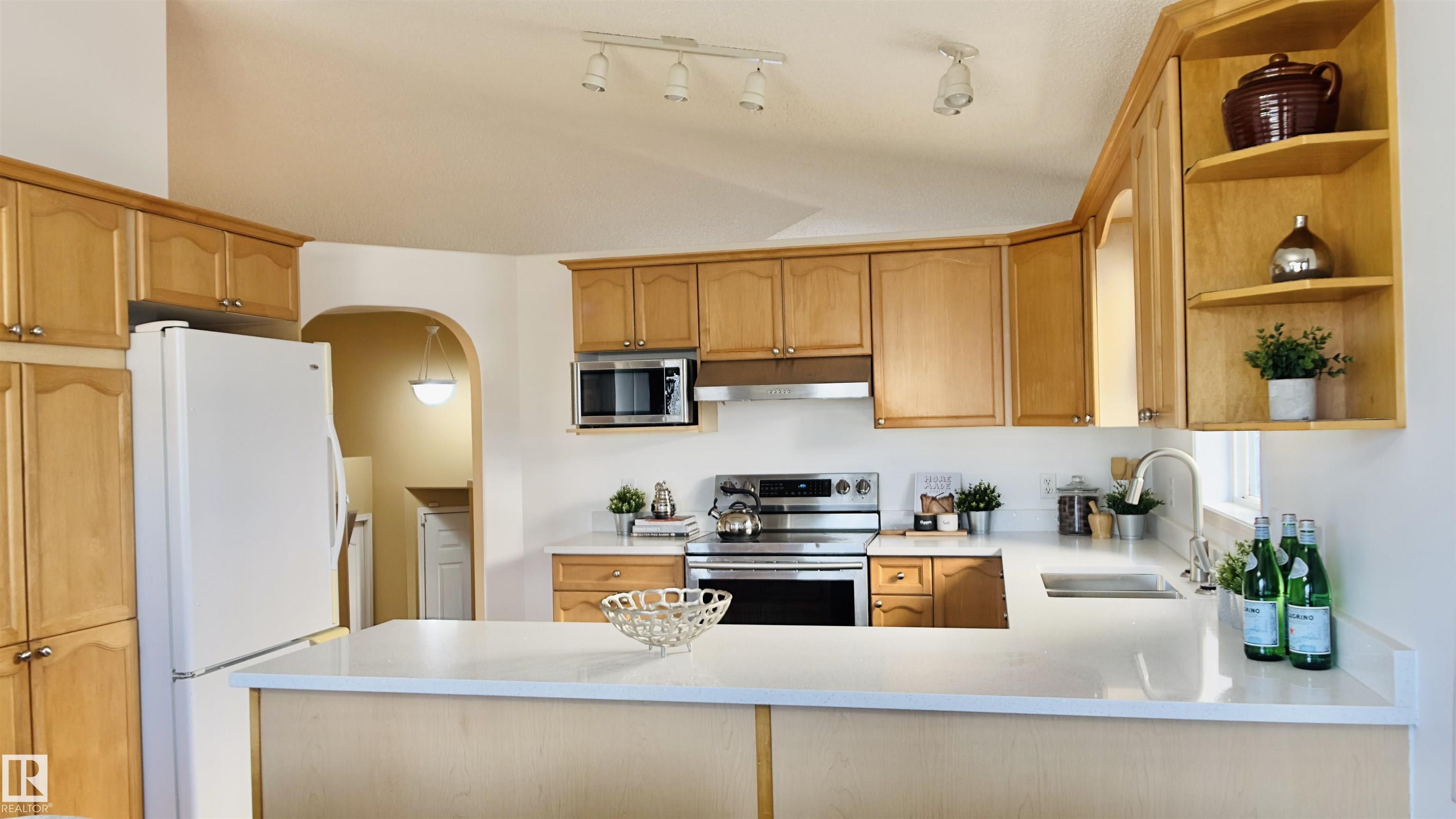 Photo 7 at 13023 35 Street NW, Belmont, Edmonton