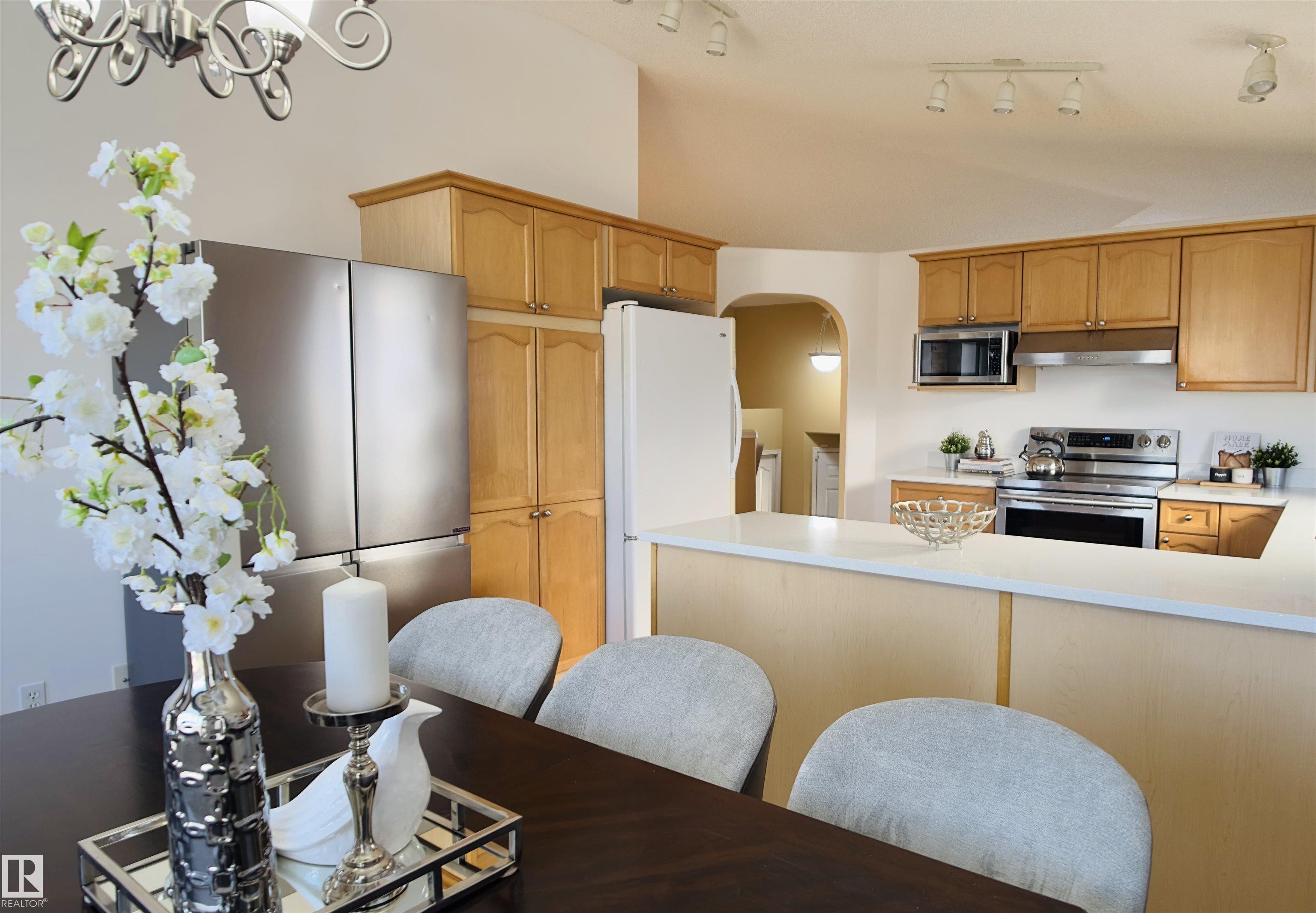 Photo 10 at 13023 35 Street NW, Belmont, Edmonton