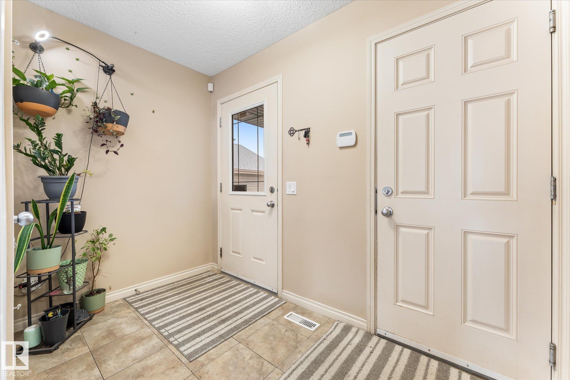 Photo 2 at 51 Silverstone Drive, Silverstone, Stony Plain