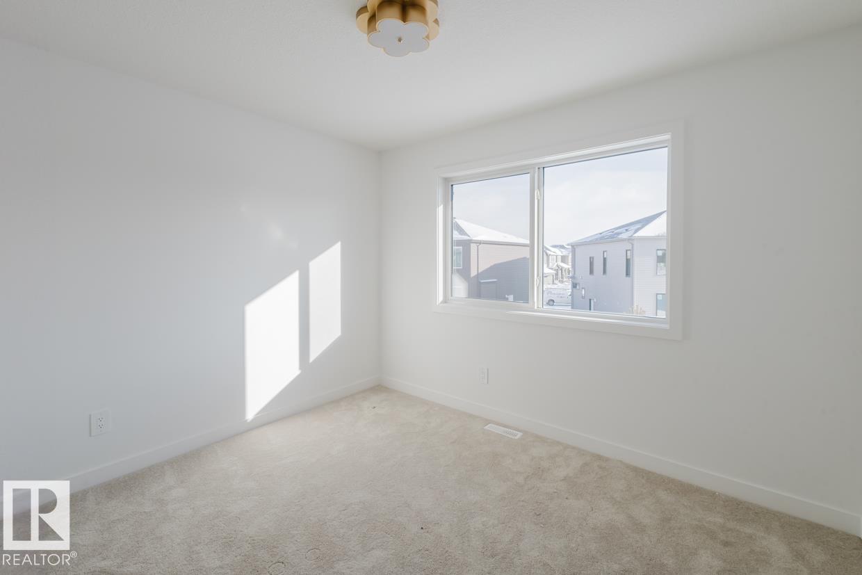 Photo 11 at 39 Chartres Close, Chérot, St. Albert