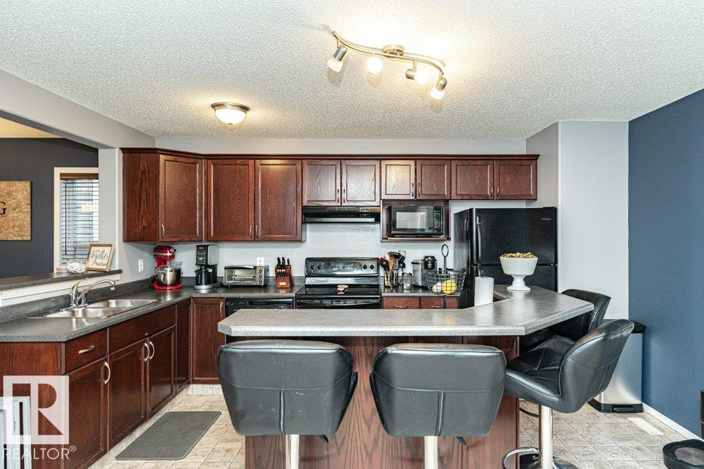 Photo 13 at 28 Vega Avenue, Spruce Village, Spruce Grove