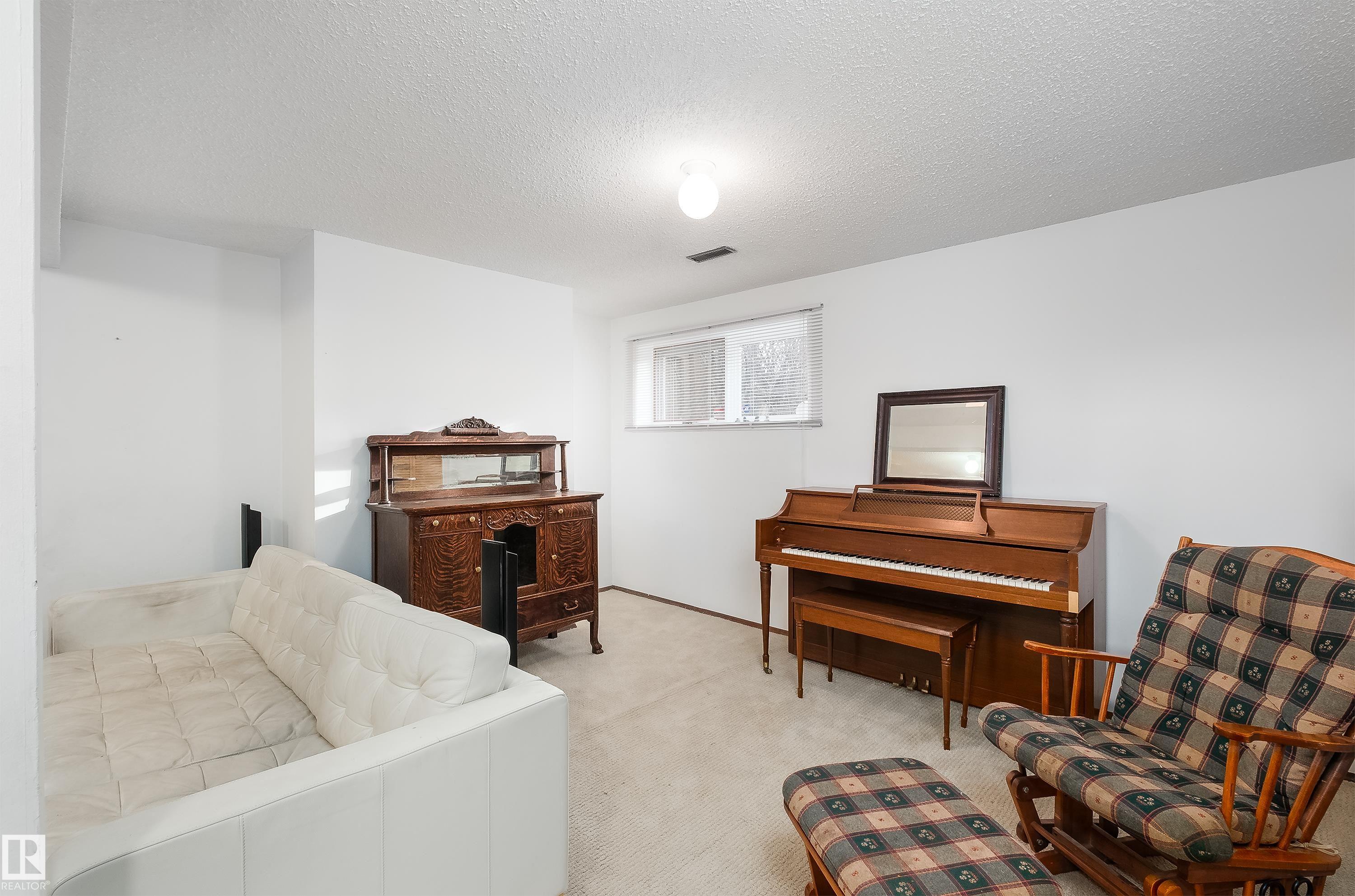 Photo 38 at 1303 35 Street NW, Crawford Plains, Edmonton