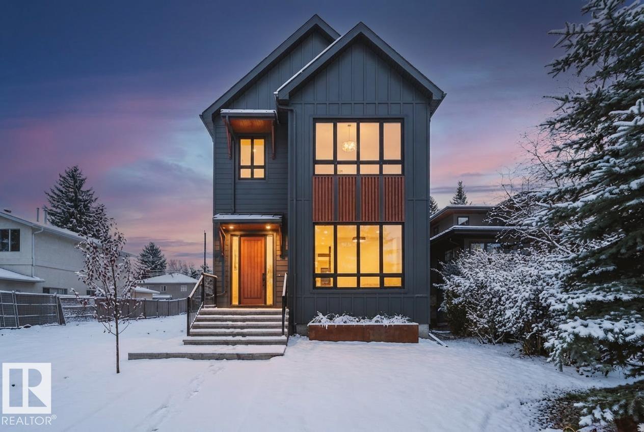 A rare opportunity built by Crimson Cove Homes, in one of Edmonton?s most prestigious areas just off Valleyview Drive! This nearly 2,500 sqft 4 bed, 3.5 bath home is just steps from iconic River Valley views. Inside, 10' main floor ceilings create a grand feel, w/dbl doors to your office & a stylish 2pc bath featuring marbled Dekton counters. The chef-inspired kitchen boasts local "Redl" cabinetry, Frigidaire Professional appliances, induction cooktop, oversized fridge/freezer, & butler?s pantry w/Blanco sink. The dreamy primary suite offers vaulted ceilings, a "speakeasy" walk-in closet, & spa-like 5pc ensuite. Upstairs: 2 more large beds, 5pc bath & Electrolux laundry w/a sink. The finished basement adds a wet bar w/bev fridge + dishwasher, huge bedroom, & WIC. Extras: heated dbl garage, Hardie board exterior, fully landscaped (fence is included), composite 2-tiered deck, pot filler, trpl-pane All Weather windows, Dekton/Silestone finishes, and a cozy fireplace. Parkview is calling!