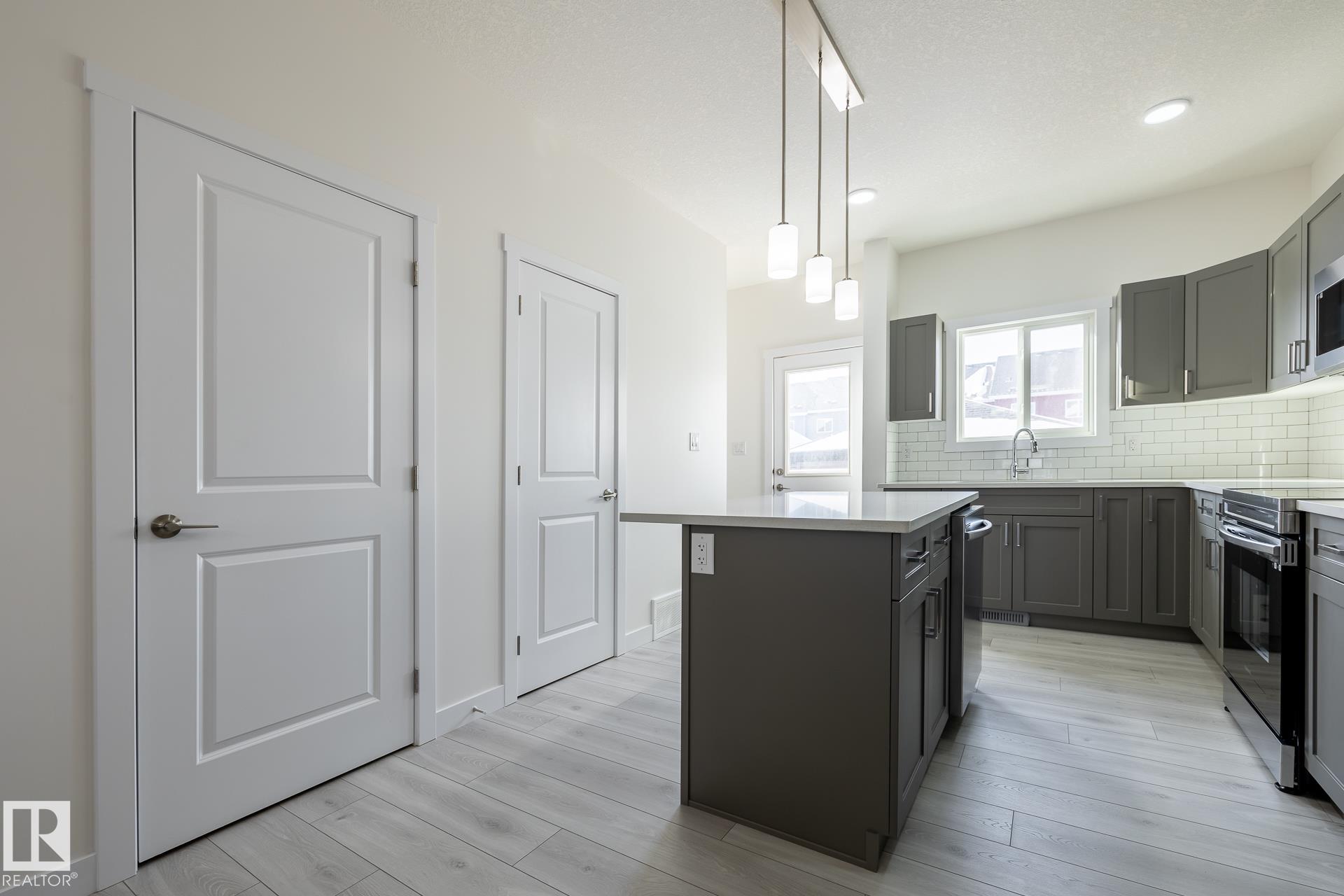 Photo 8 at 15647 2 Street NE, Quarry Ridge, Edmonton