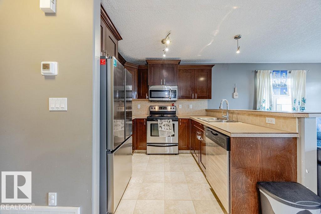 Photo 7 at 42 - 9511 102 Avenue, Morinville