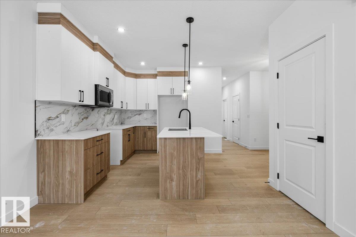 Photo 7 at 131 Creekside Lane, Creekside, Leduc