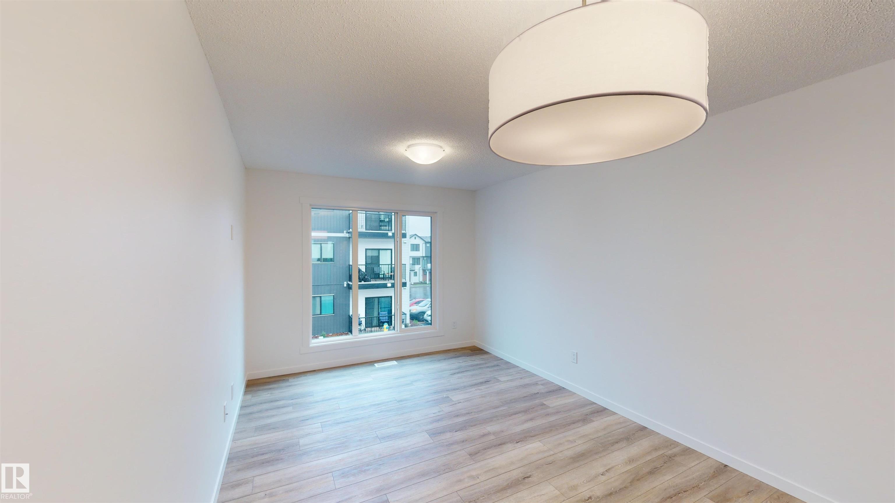 Photo 6 at 6 - 29 Airport Road NW, Blatchford Area, Edmonton