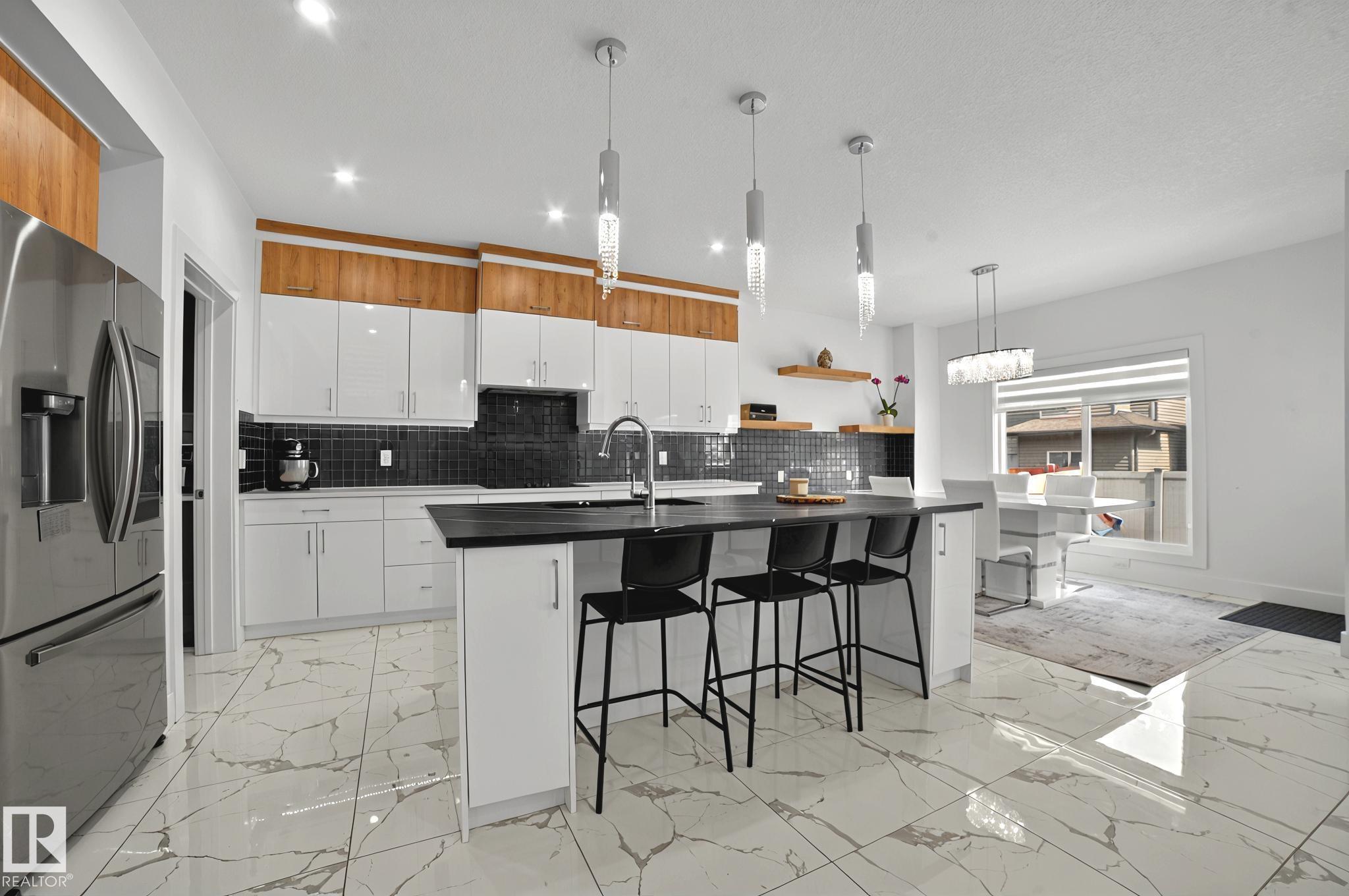 Photo 11 at 15023 15 Street NW, Fraser, Edmonton